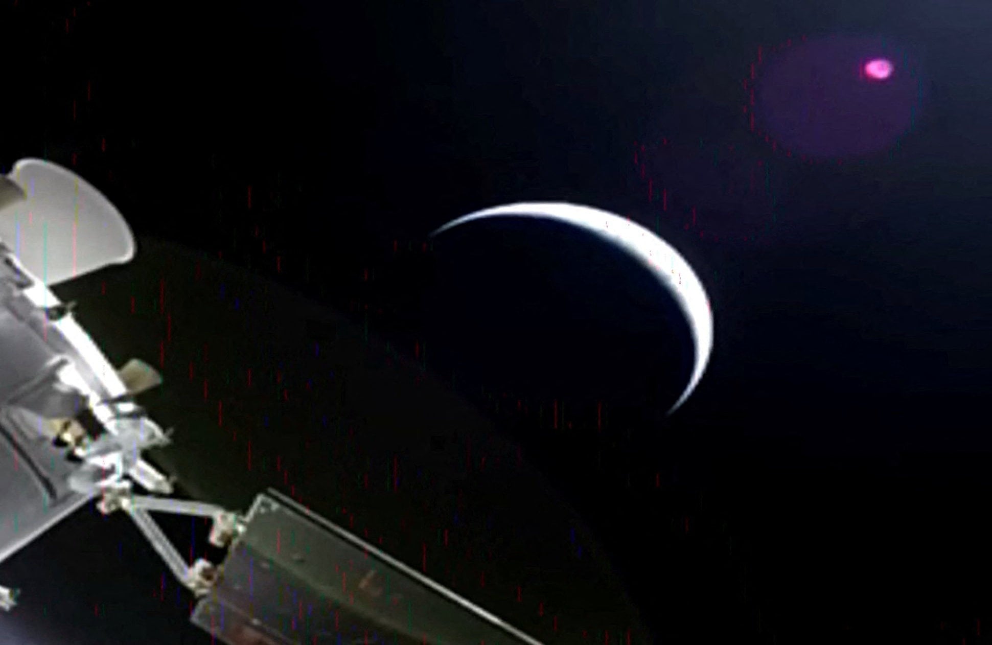 The Artemis II mission’s Orion capsule leaves Earth on its way to fly by the moon on Wednesday. Photo: Nasa TV via Reuters