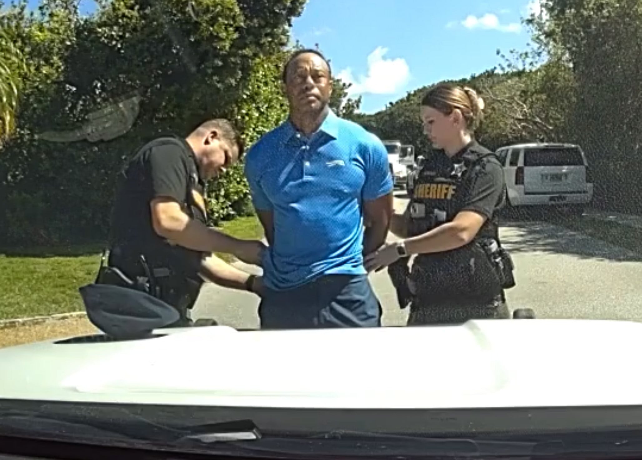 Tiger Woods is taken into custody by sheriff’s deputies following a car crash in Jupiter Island, Florida, in March. Photo: Martin County Sheriff’s Office via AP
