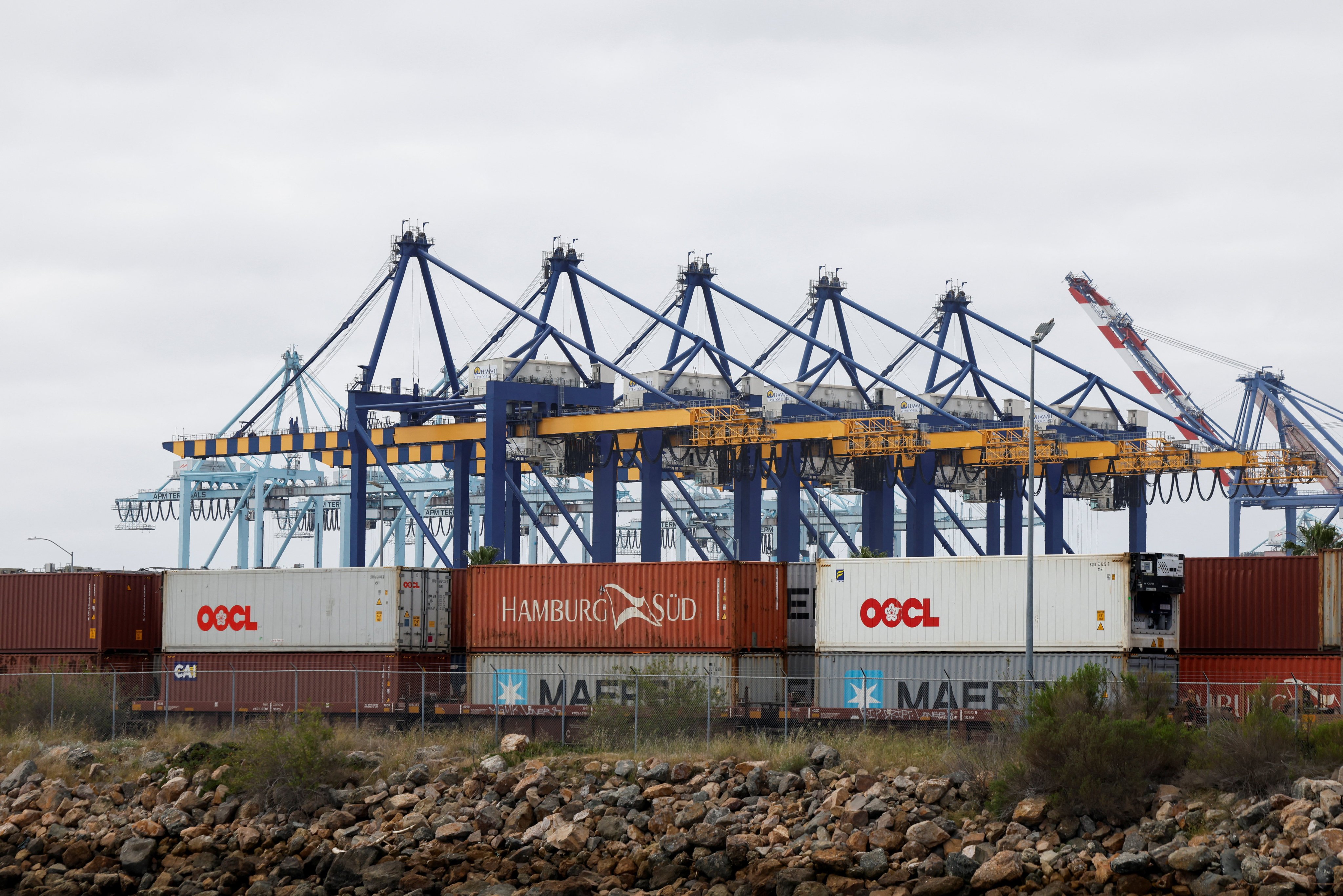 Shipping containers wait to be transported along a railroad at the port of Los Angeles in Long Beach, California, one of the busiest gateways for US trade. Photo: Reuters