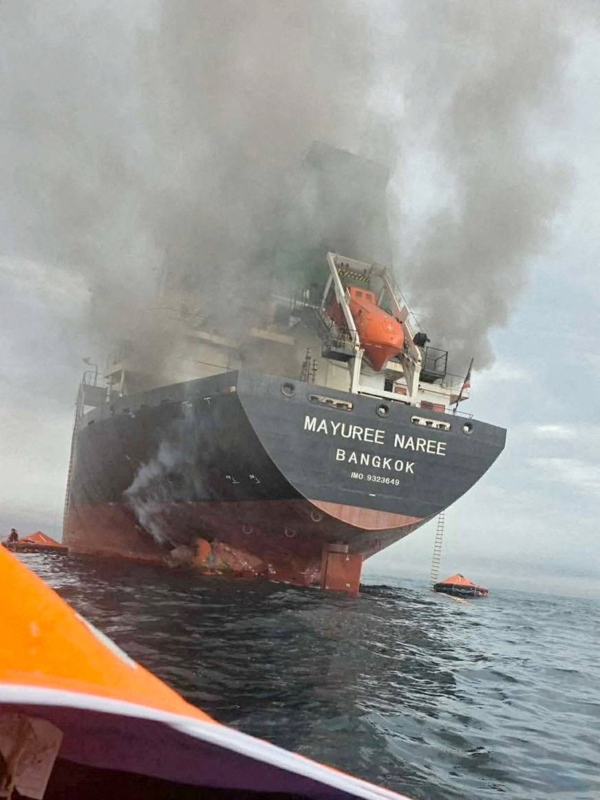 The cargo ship Mayuree Naree, engulfed in smoke, in the Strait of Hormuz on March 11. Photo: Handout via Reuters