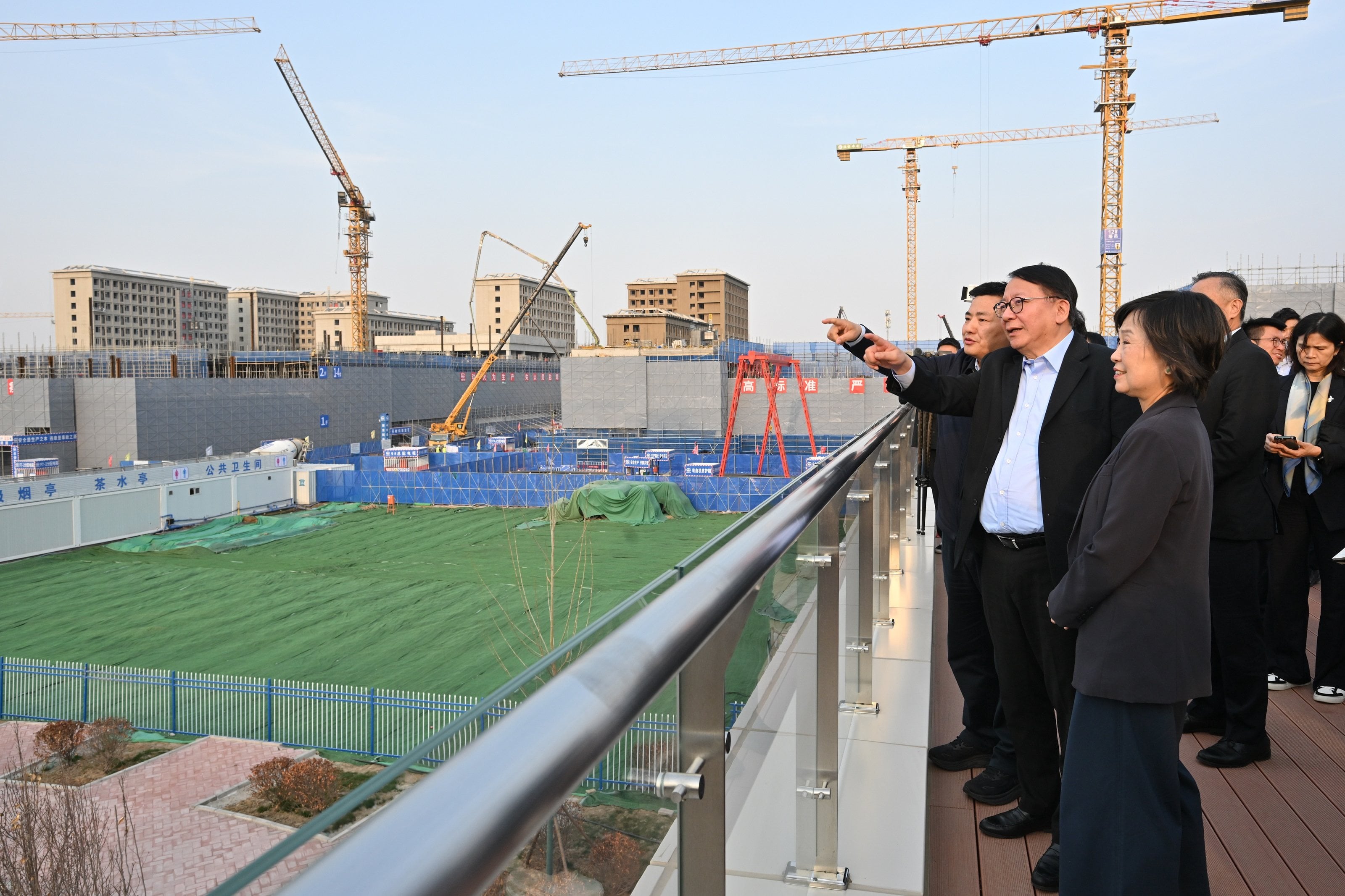 Chief Secretary Eric Chan (second from left) and his working group visit a university campus in mainland China in 2024. Photo: Handout