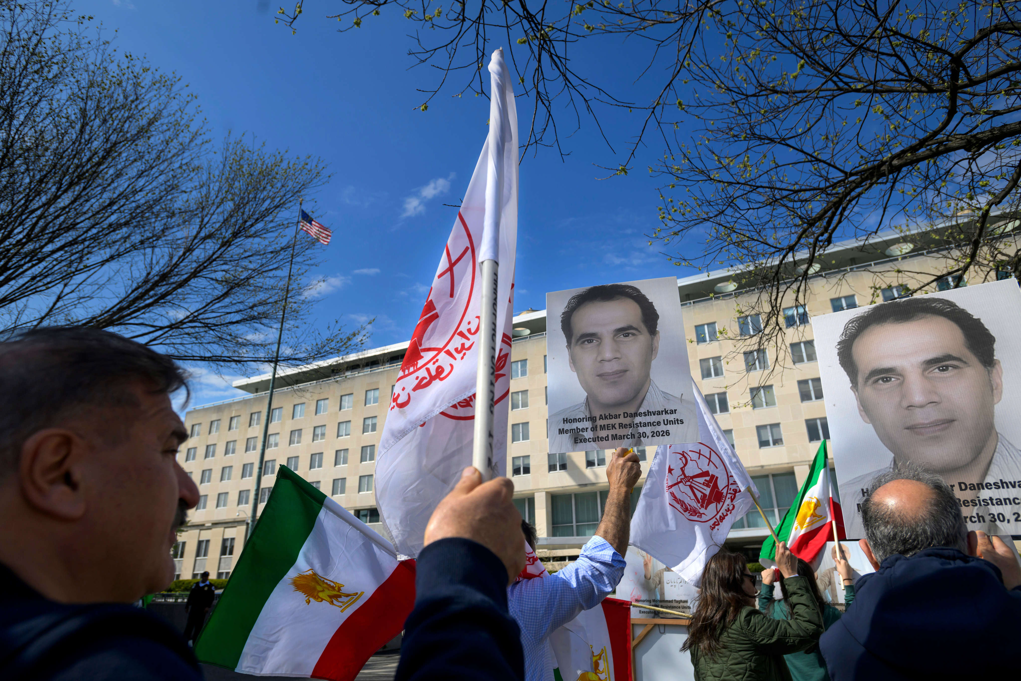 People protest outside the US State Department on Monday to highlight the executions of MEK members in Karaj, Iran. Photo: AP