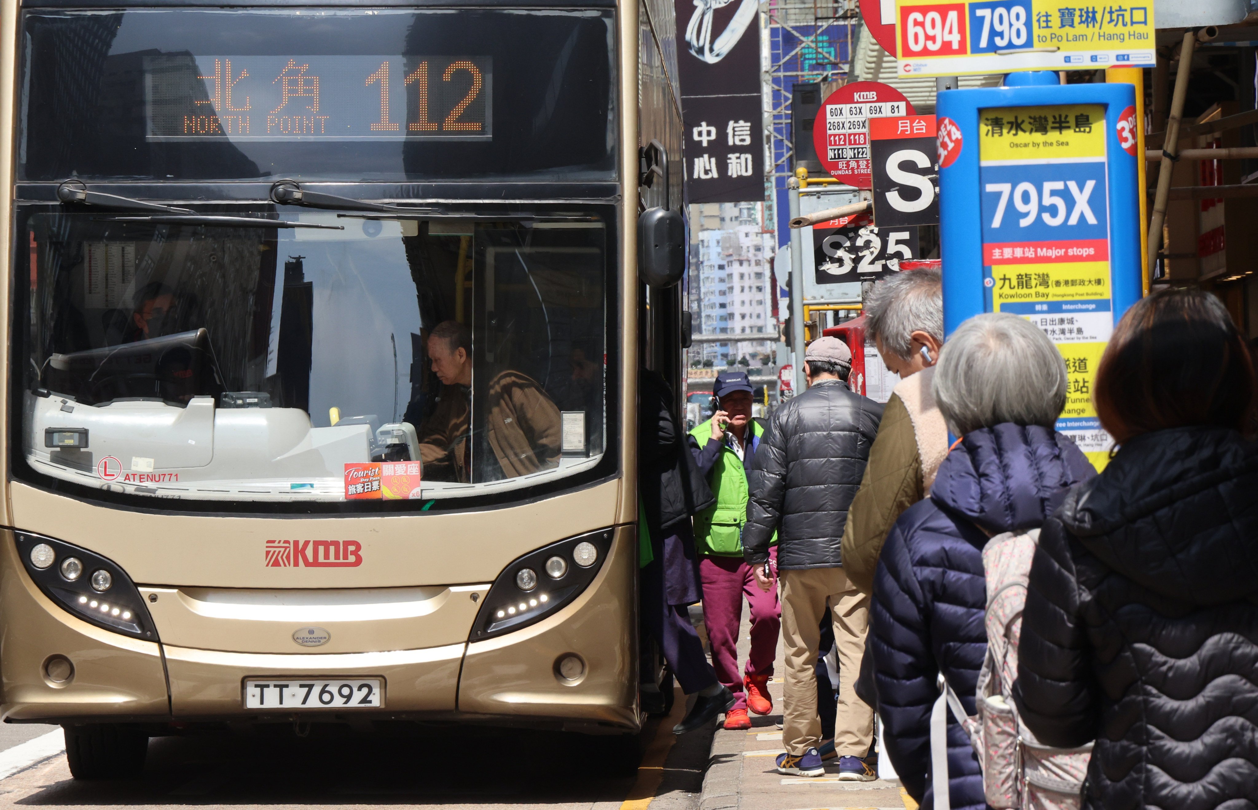 Passengers at a bus stop at Nathan Road in Yau Ma Tei. Photo: Jelly Tse