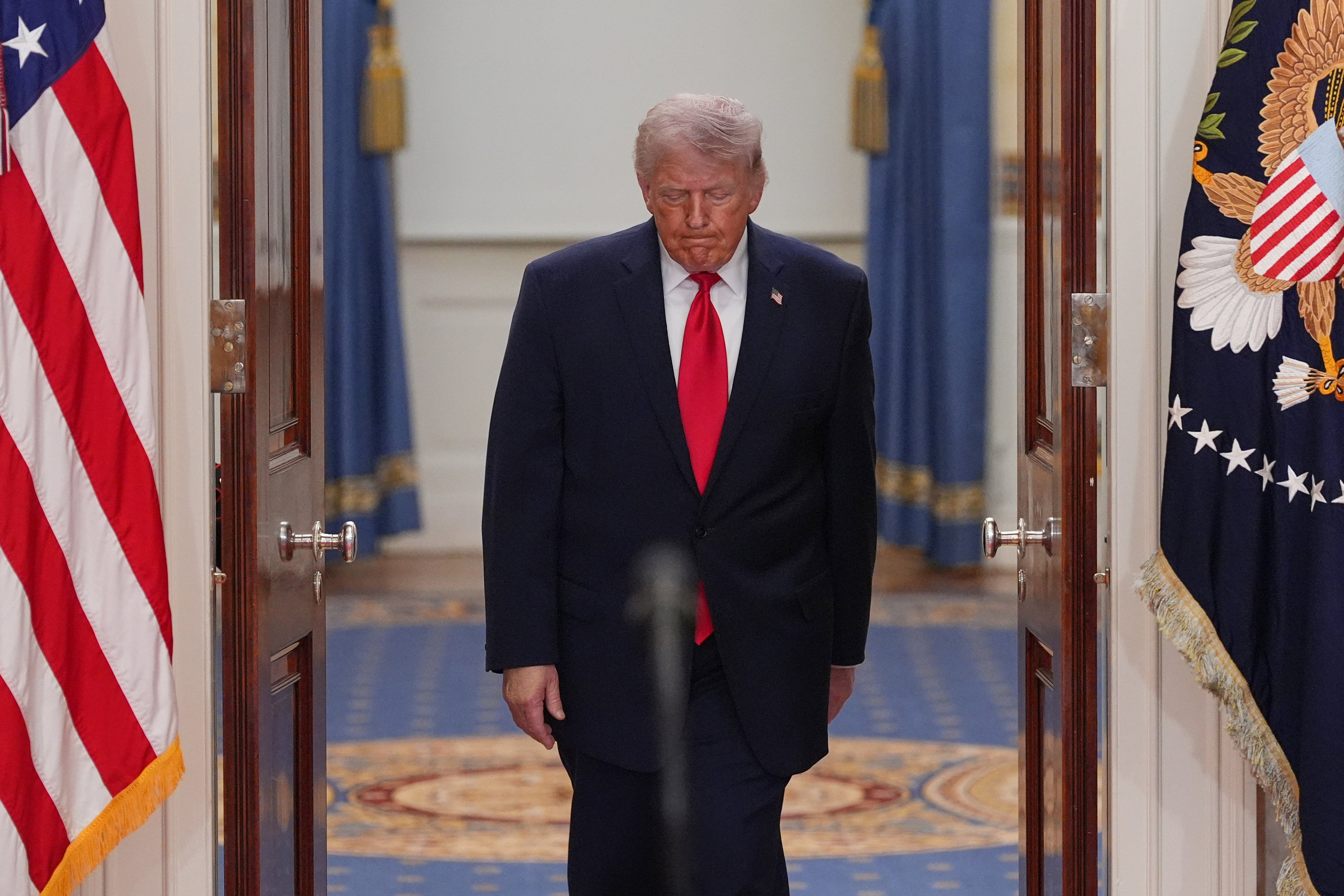 US President Donald Trump arrives to speak about the Iran war from the Cross Hall of the White House on Wednesday. Photo: AP