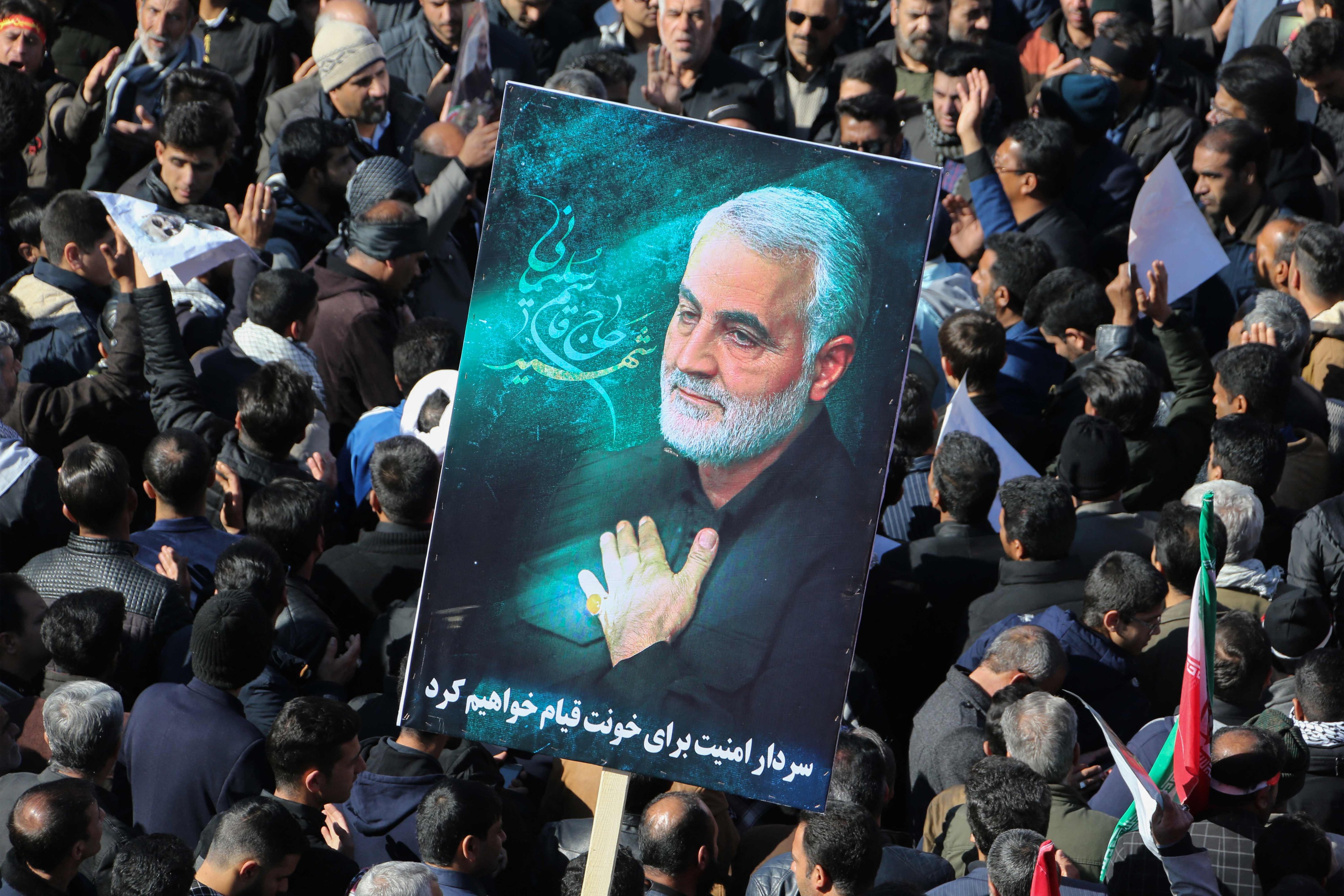 Iranian mourners gather during the final stage of funeral processions for slain top general Qasem Soleimani in his hometown Kerman in January 2020. Photo: AFP