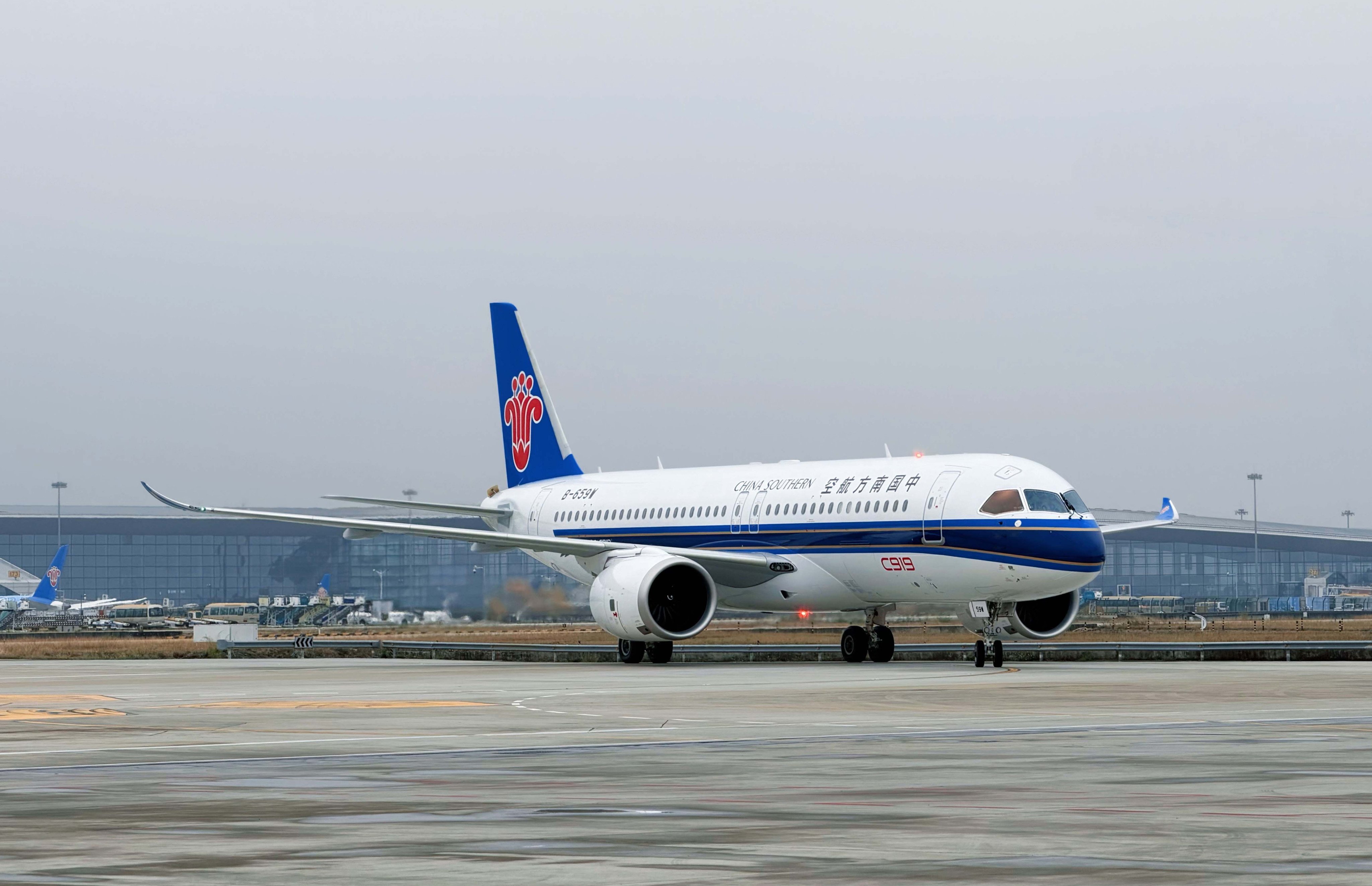 A domestically-produced C919 lands at Guangzhou Baiyun International Airport. Photo: Handout