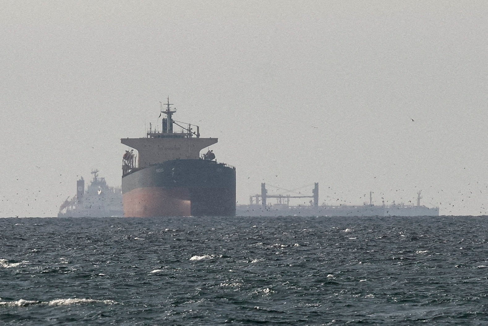 Cargo ships near the Strait of Hormuz on March 11. Photo: Reuters