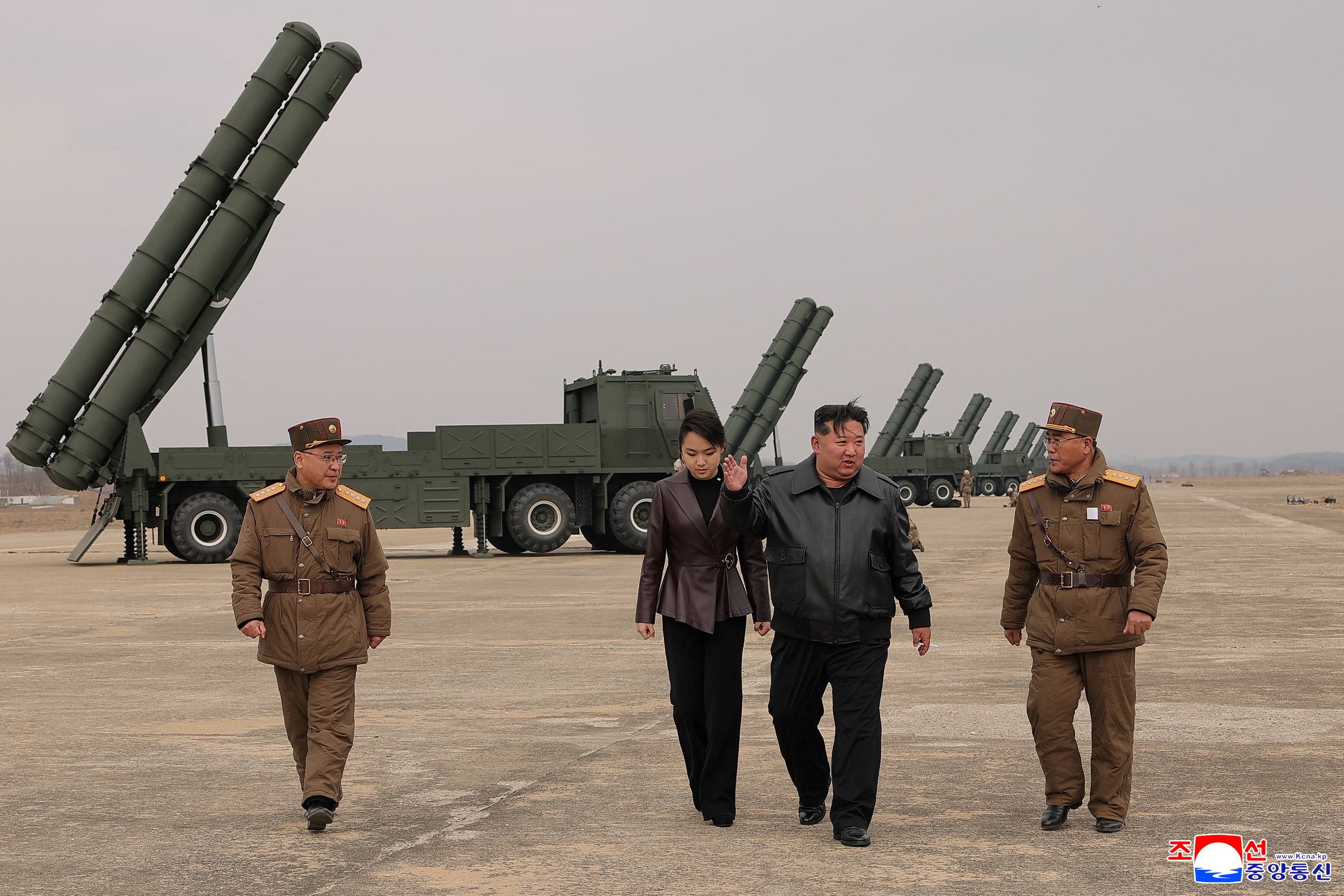 North Korean leader Kim Jong-un and daughter Ju Ae oversee the test-launch of 600 mm-calibre multiple rocket launchers on March 14. Photo: KCNA/Reuters