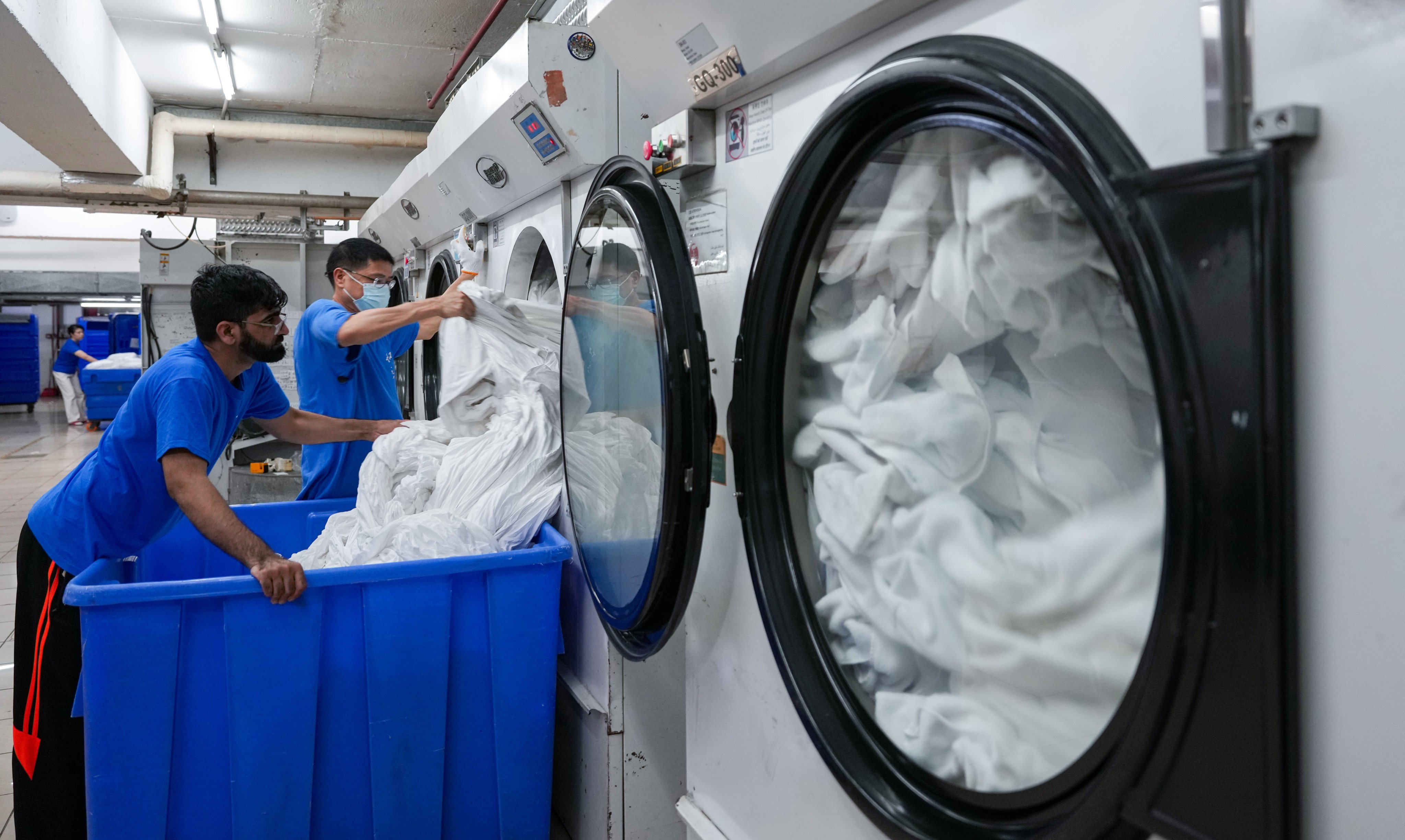 Workers at Yue Yi Laundry Factory in Tuen Mun. Photo: Sam Tsang