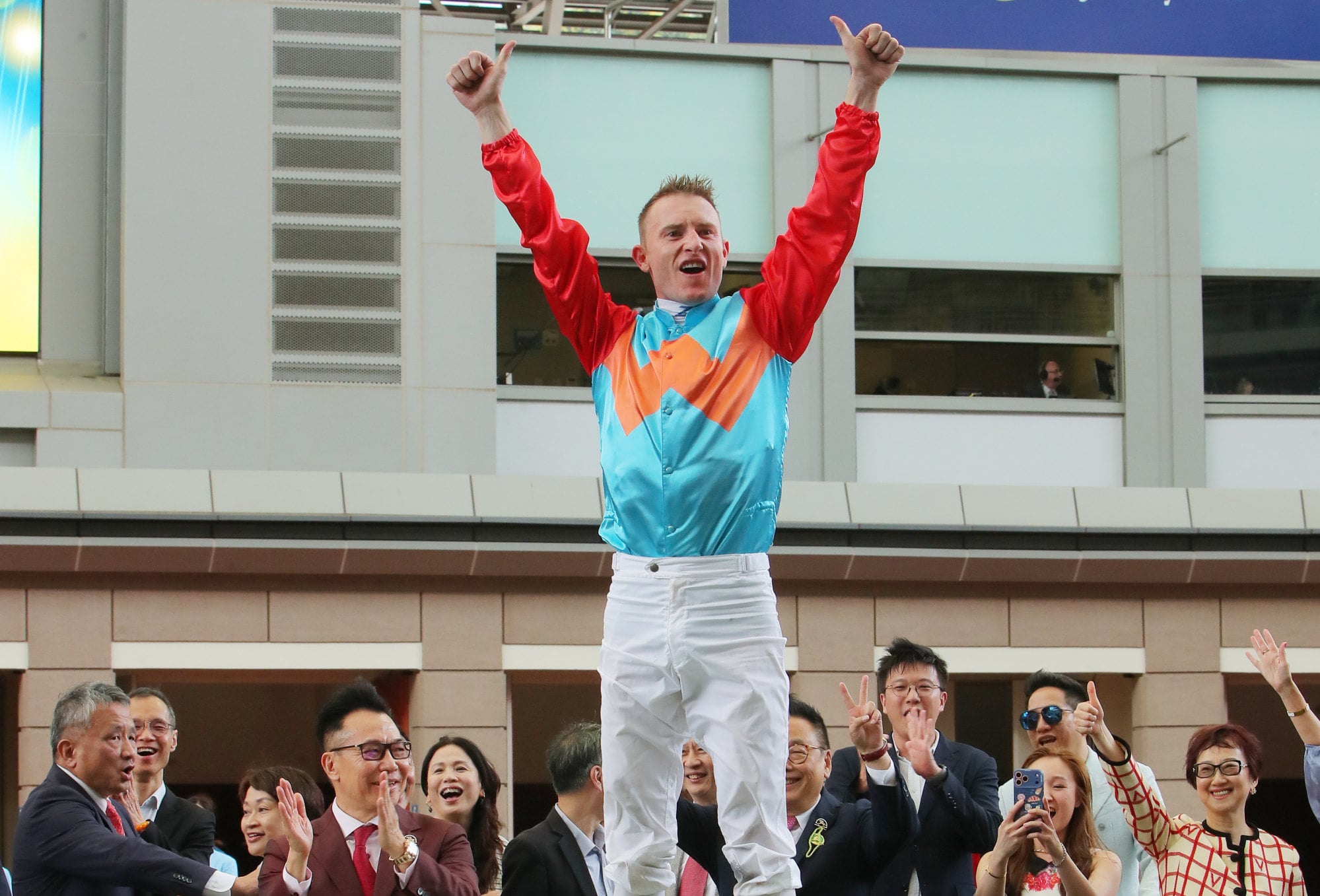 Zac Purton celebrates Ka Ying Rising's 19th straight win.