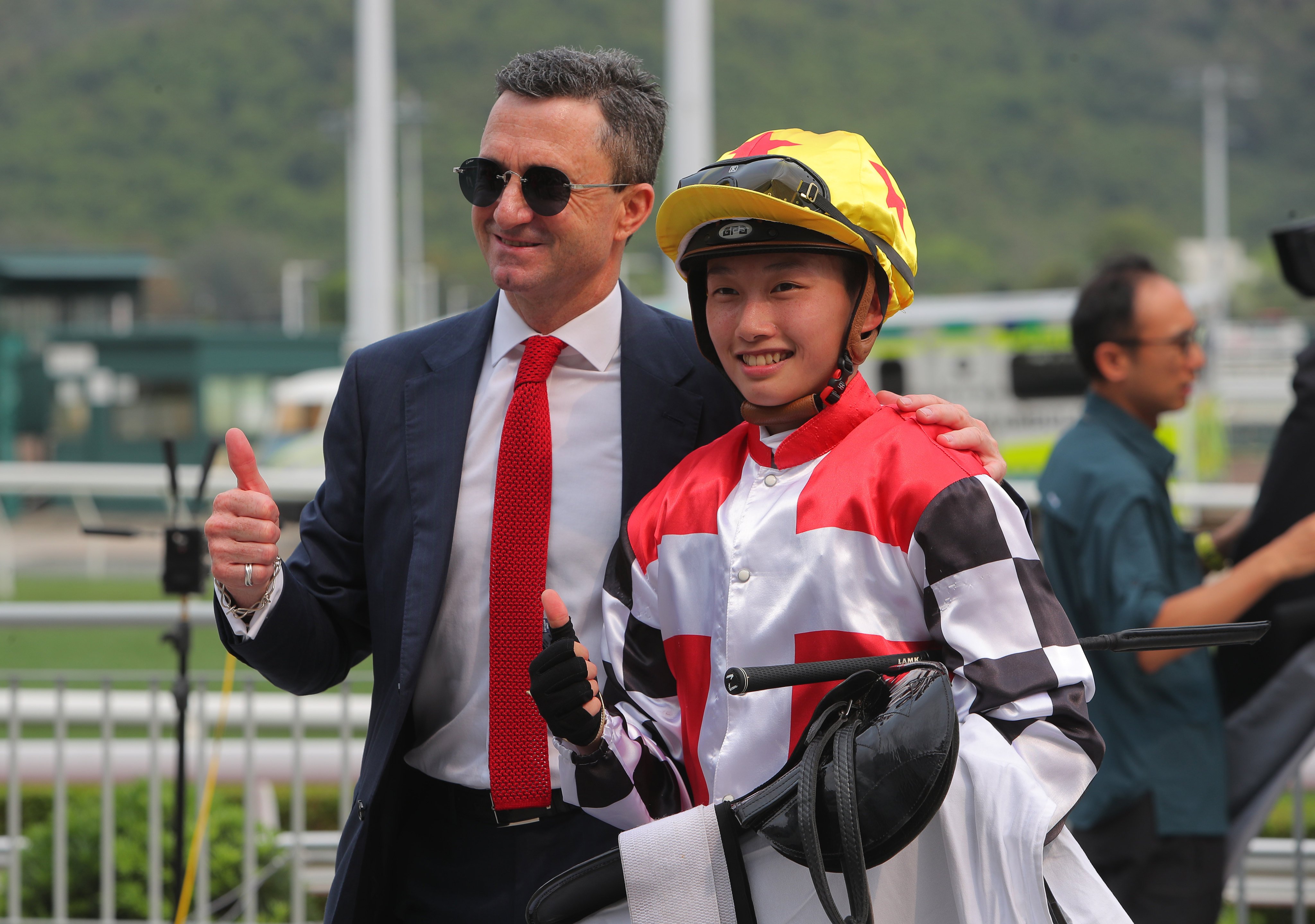 Douglas Whyte and apprentice Nichola Yuen are all smiles after their win with Fast Responder at Sha Tin. Photos: Kenneth Chan
