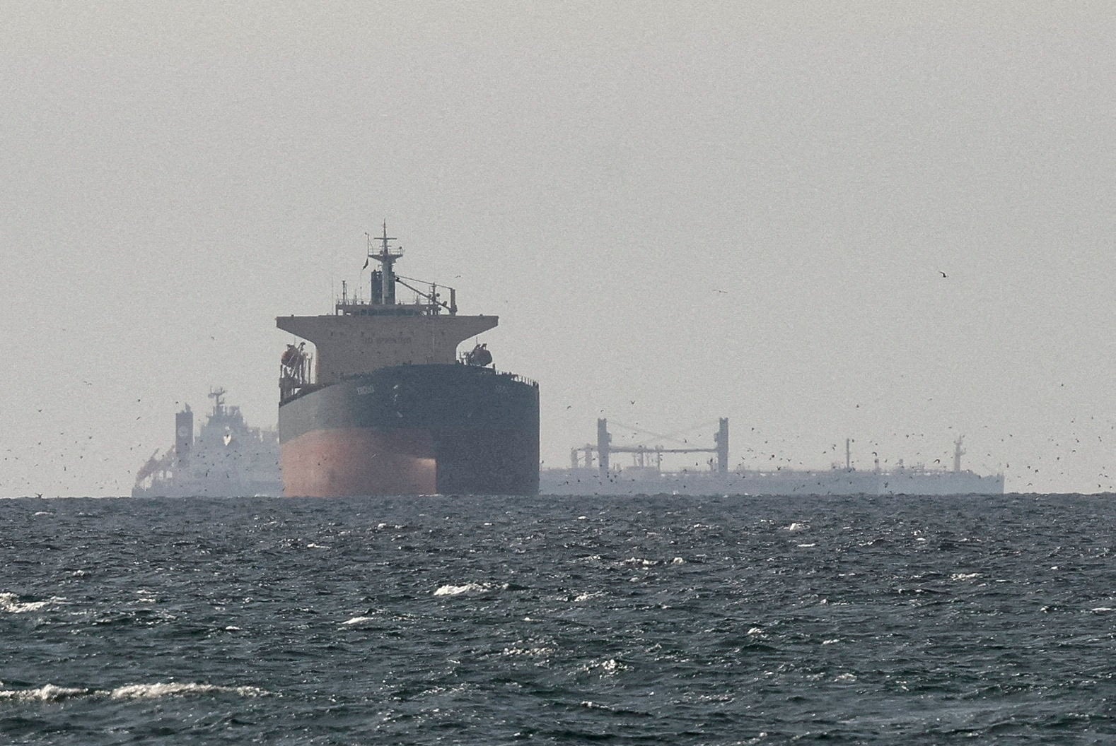 Cargo ships in the Gulf, near the Strait of Hormuz, last month. Iran has effectively closed the waterway through which about 20 per cent of the world’s oil supply is transported. Photo: Reuters