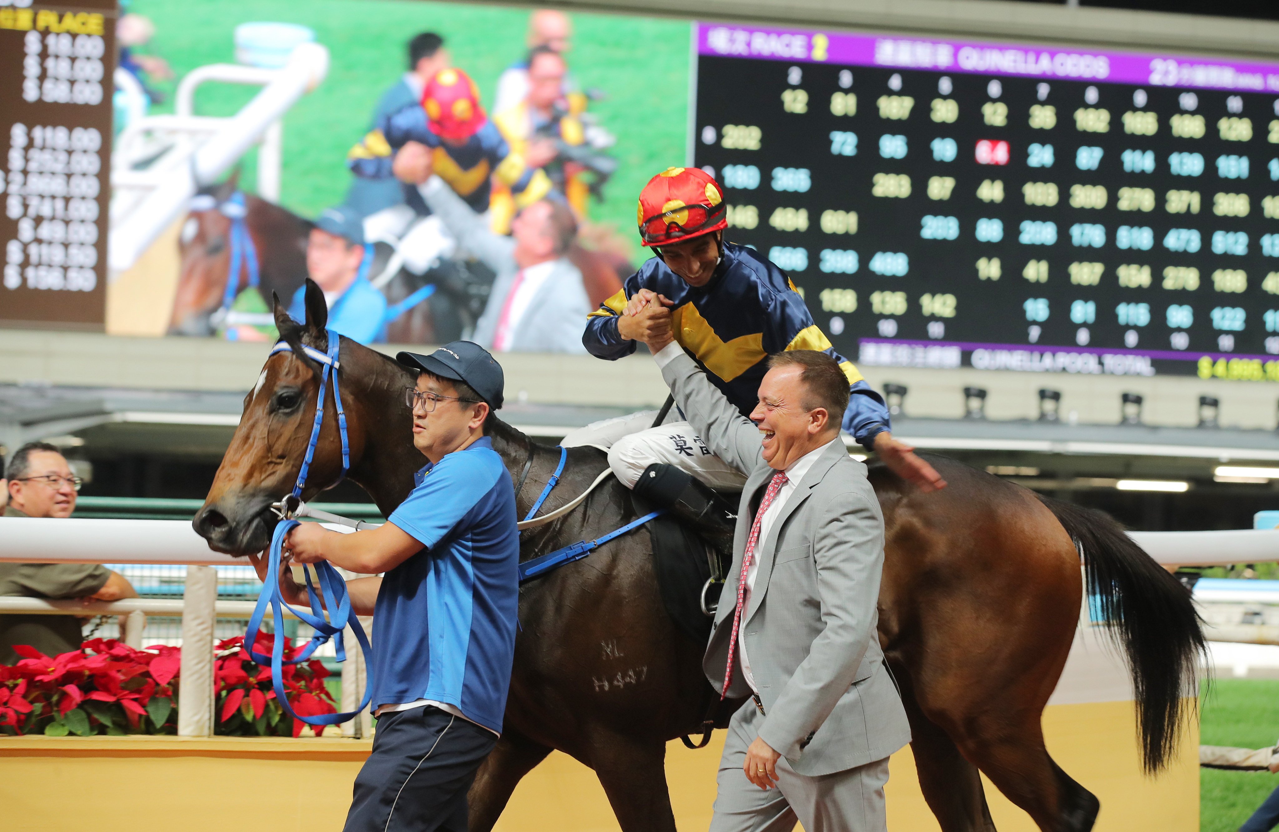 Joao Moreira and Caspar Fownes celebrate the win of Family Fortune on IJC night at Happy Valley. Photos: Kenneth Chan