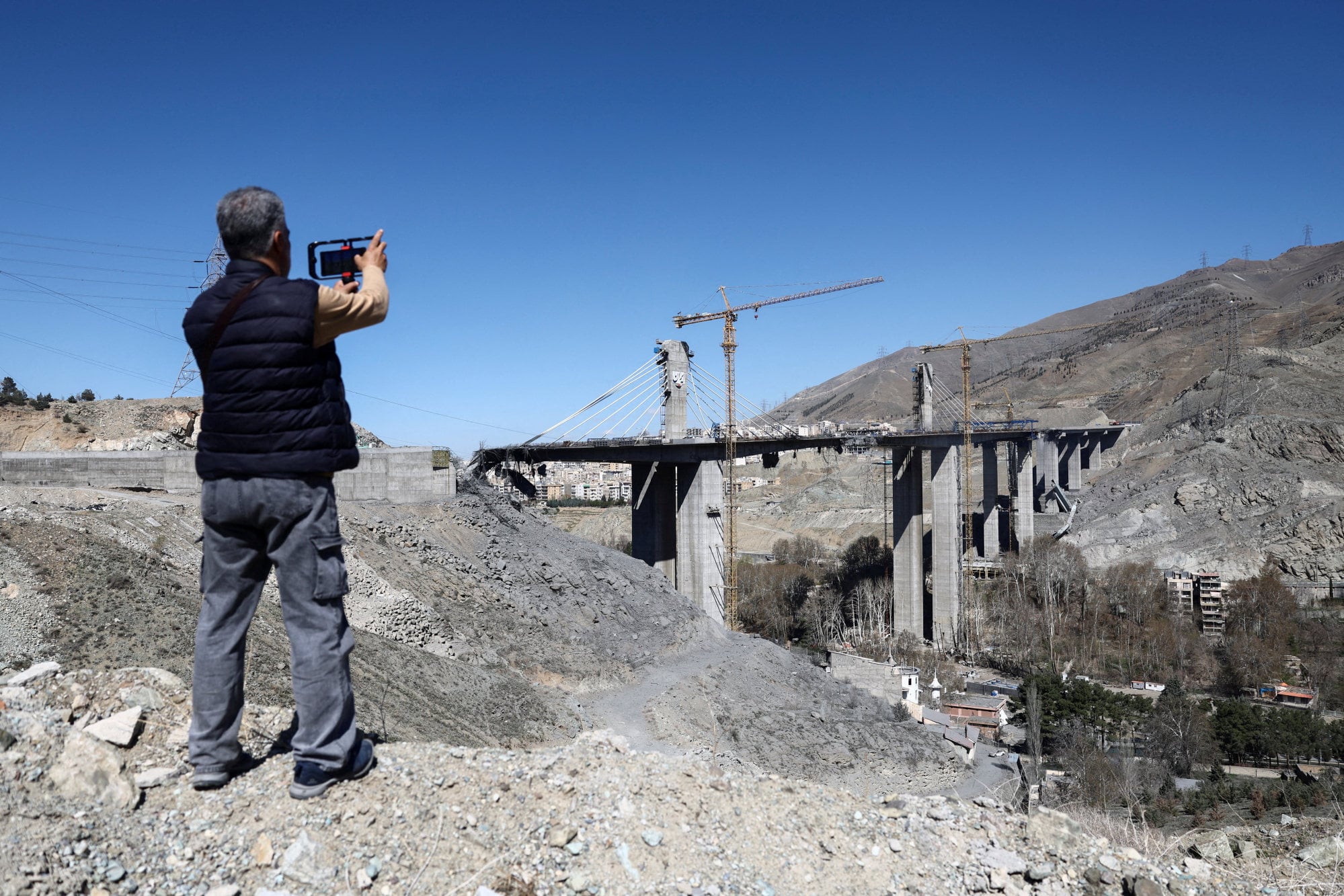 The B1 bridge in Karaj, Iran, after it was heavily damaged in a strike. Photo: West Asia News Agency via Reuters