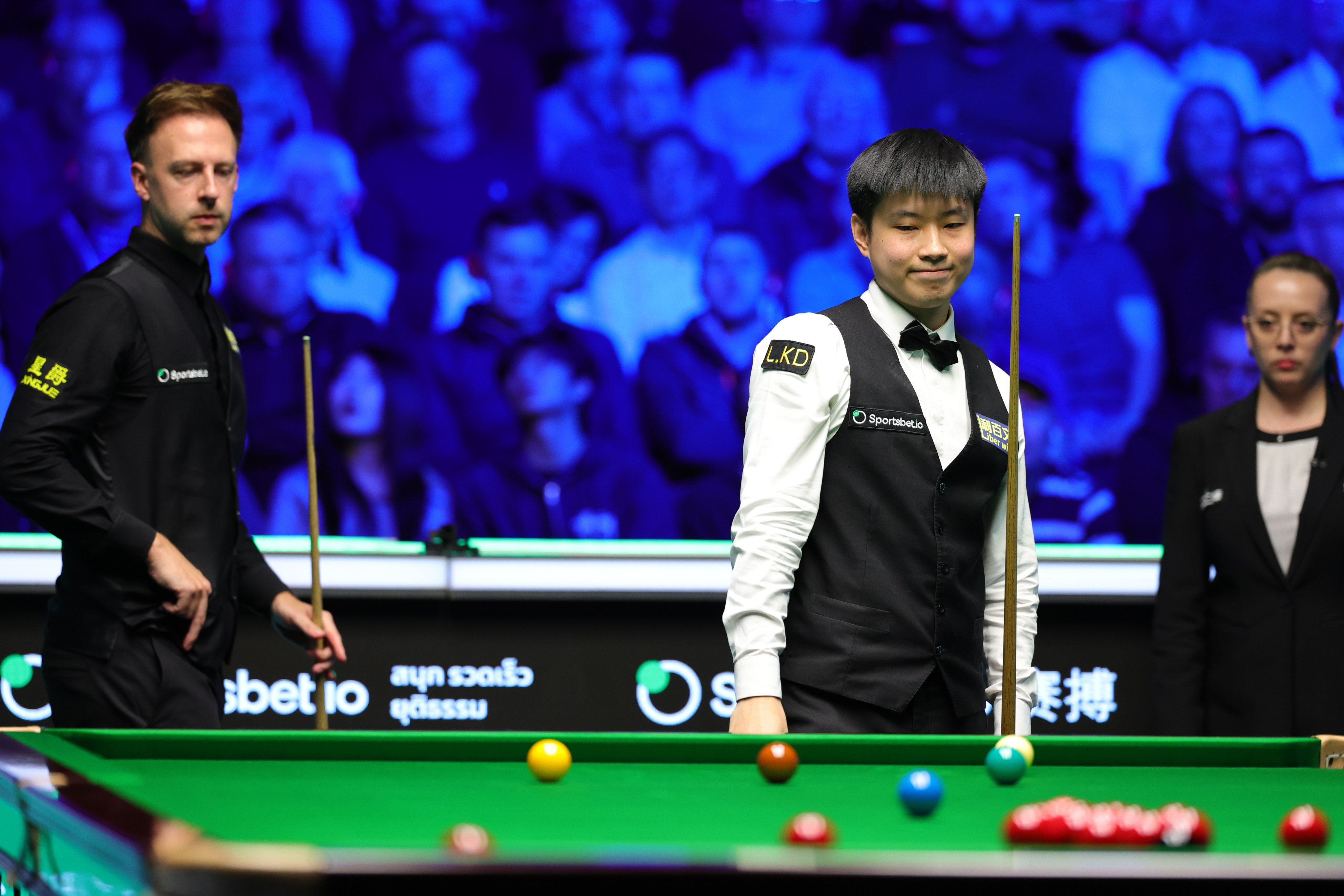 Zhao Xintong (centre) brushed aside Judd Trump (left) to win snooker’s Tour Championship. Photo: Xinhua