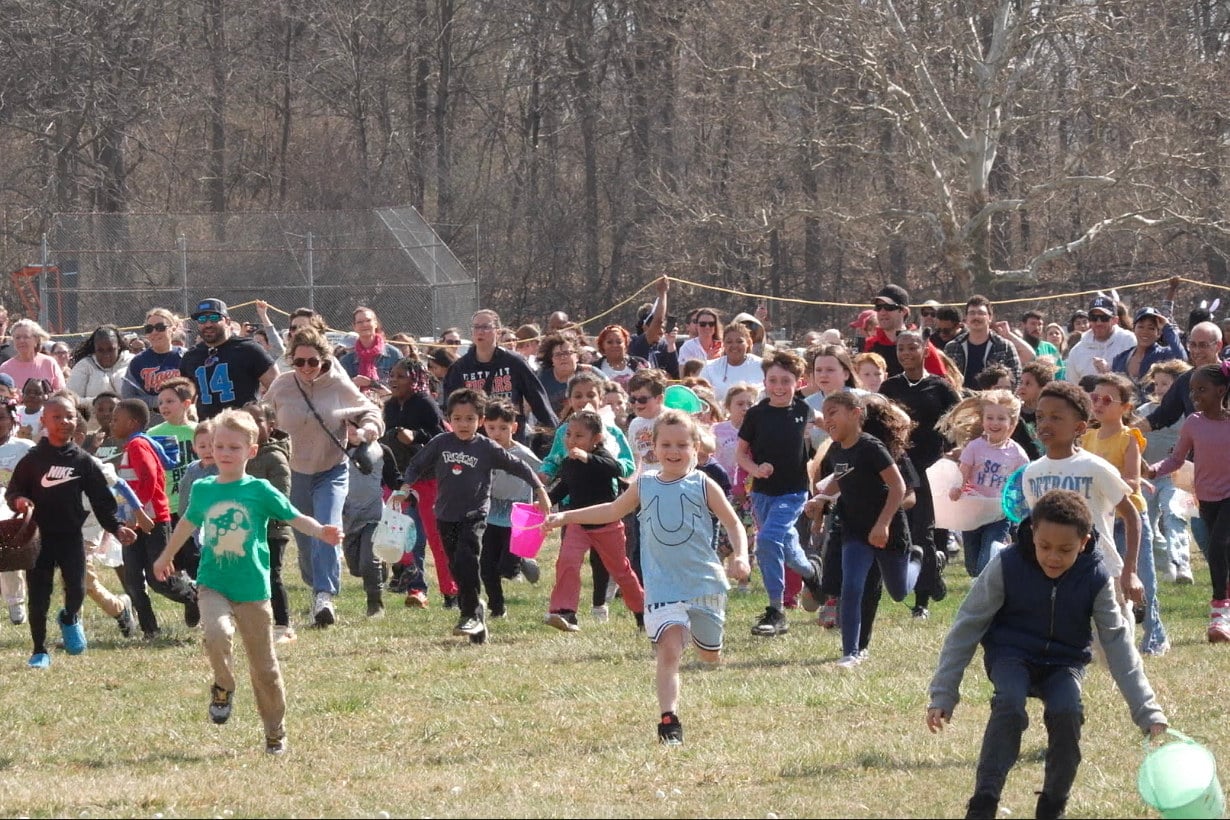 Children race to gather marshmallows dropped from a helicopter at a pair of parks in the US state of Michigan. Photo: AP