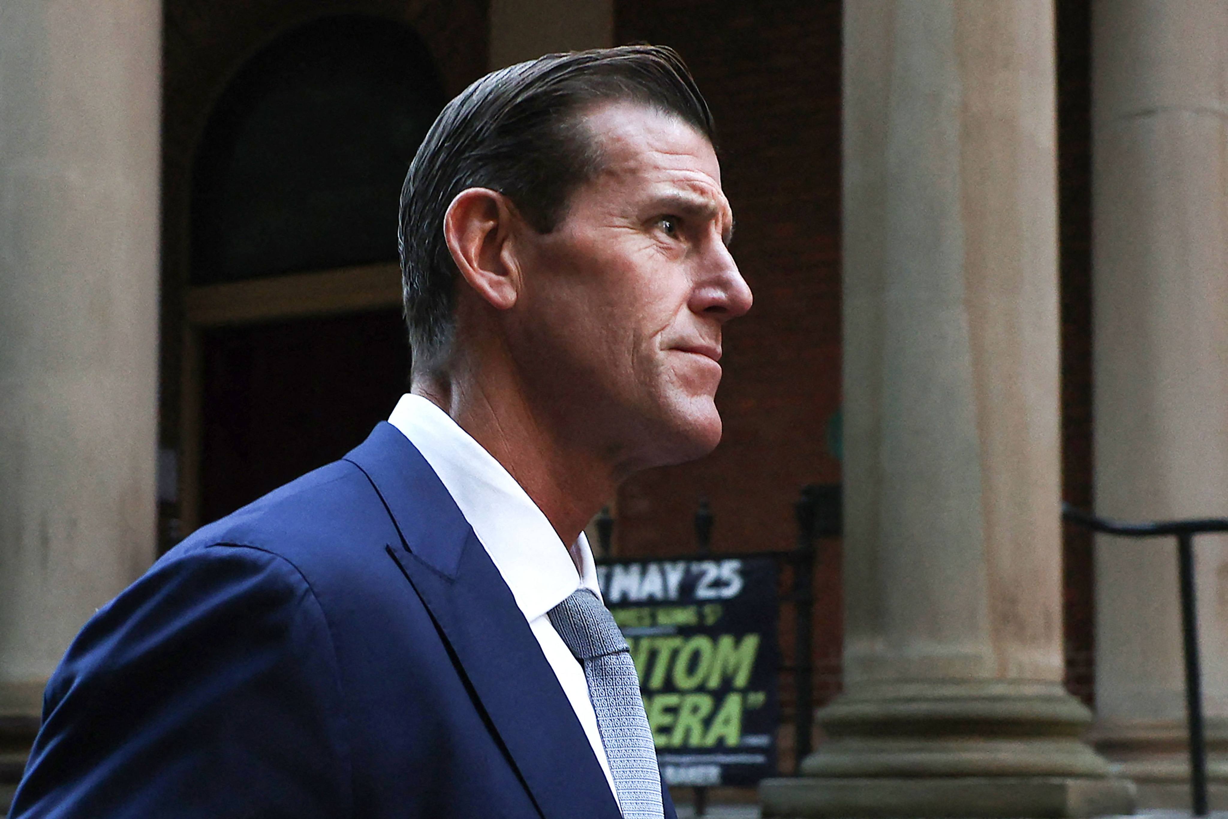 Former member of Australia’s elite Special Air Service regiment Ben Roberts-Smith leaves the Federal Court in Sydney on  May 1, 2025 .Photo: AFP