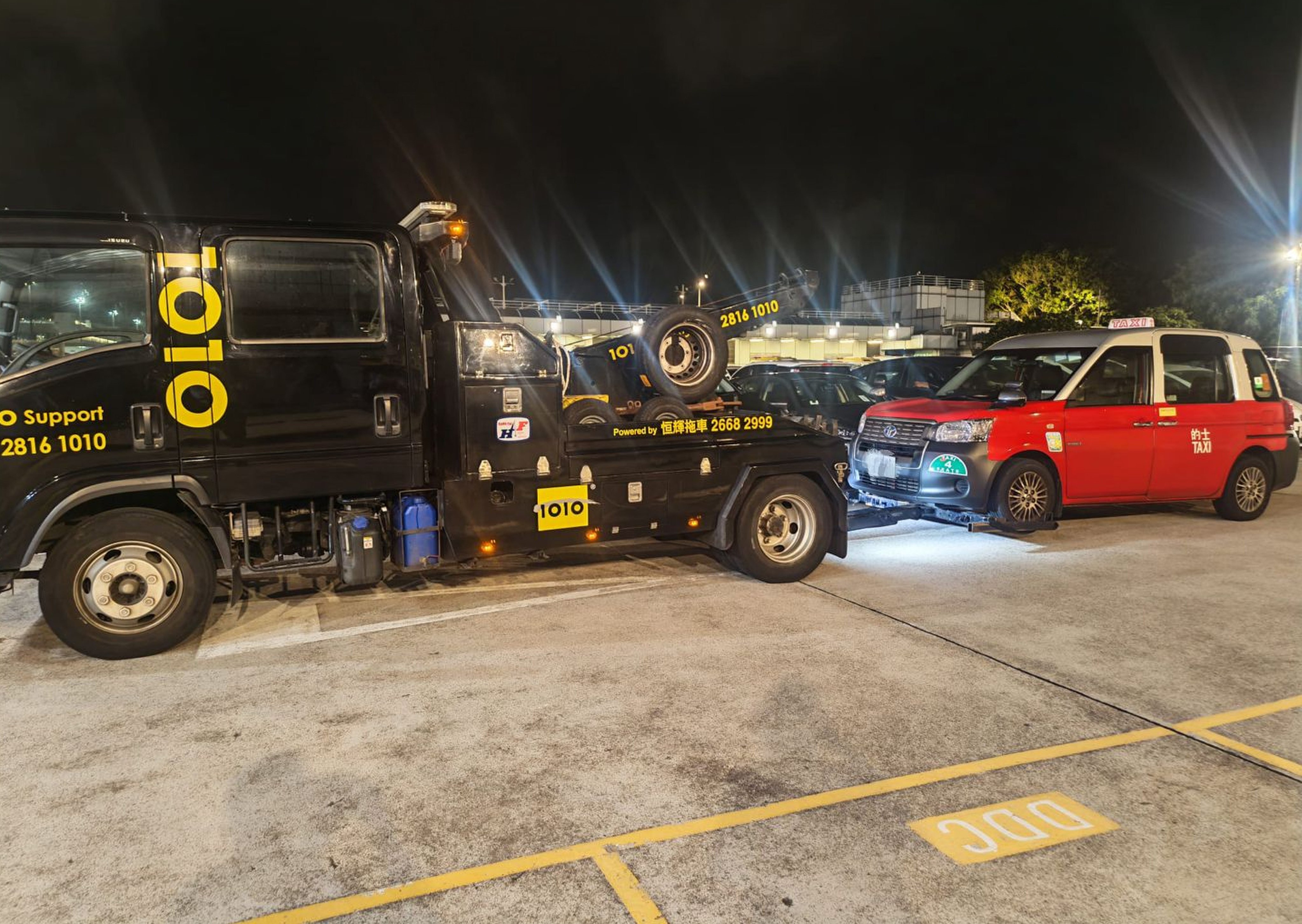 Hong Kong police have arrested a 31-year-old taxi driver who demanded a “highway toll” of about HK$85 from officers posing as passengers. Photo: Handout