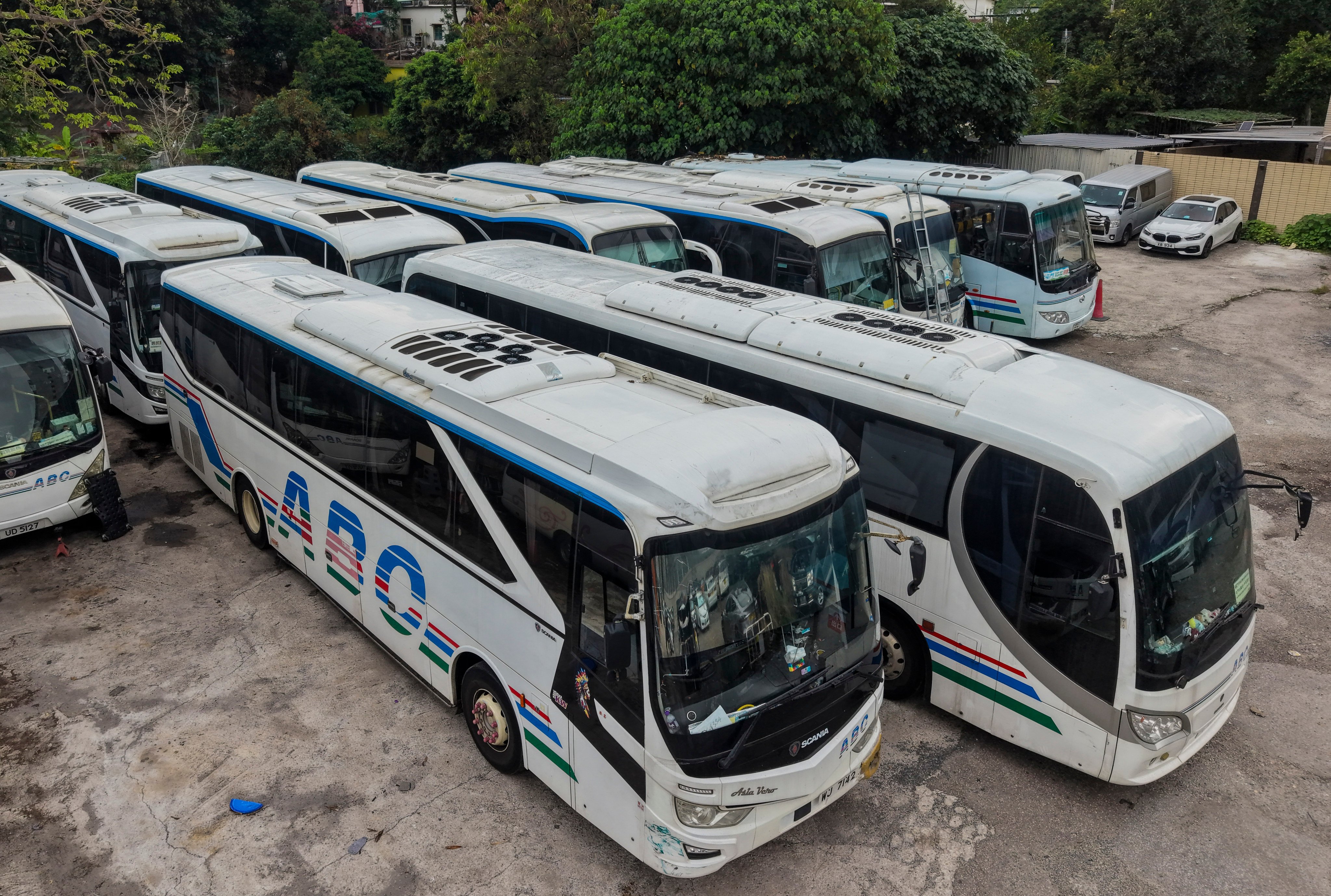 ABC Touring Car Company, a non-franchised bus firm, continues to operate rides at a loss after the government rejected its application to reduce its services. Photo: Eugene Lee