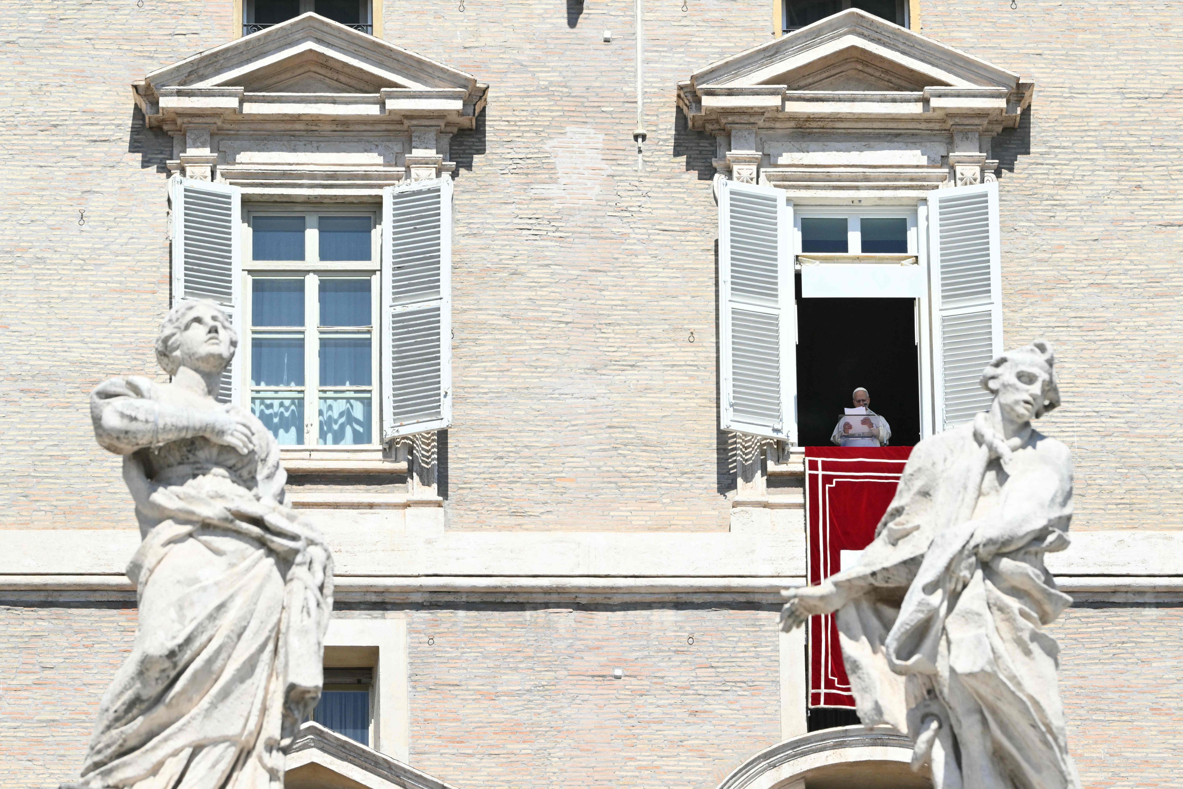 Pope Leo XIV addresses the crowd from the window of the apostolic palace overlooking St Peter’s square during the Regina Coeli prayer in The Vatican on April 6, 2026. Photo: AFP
