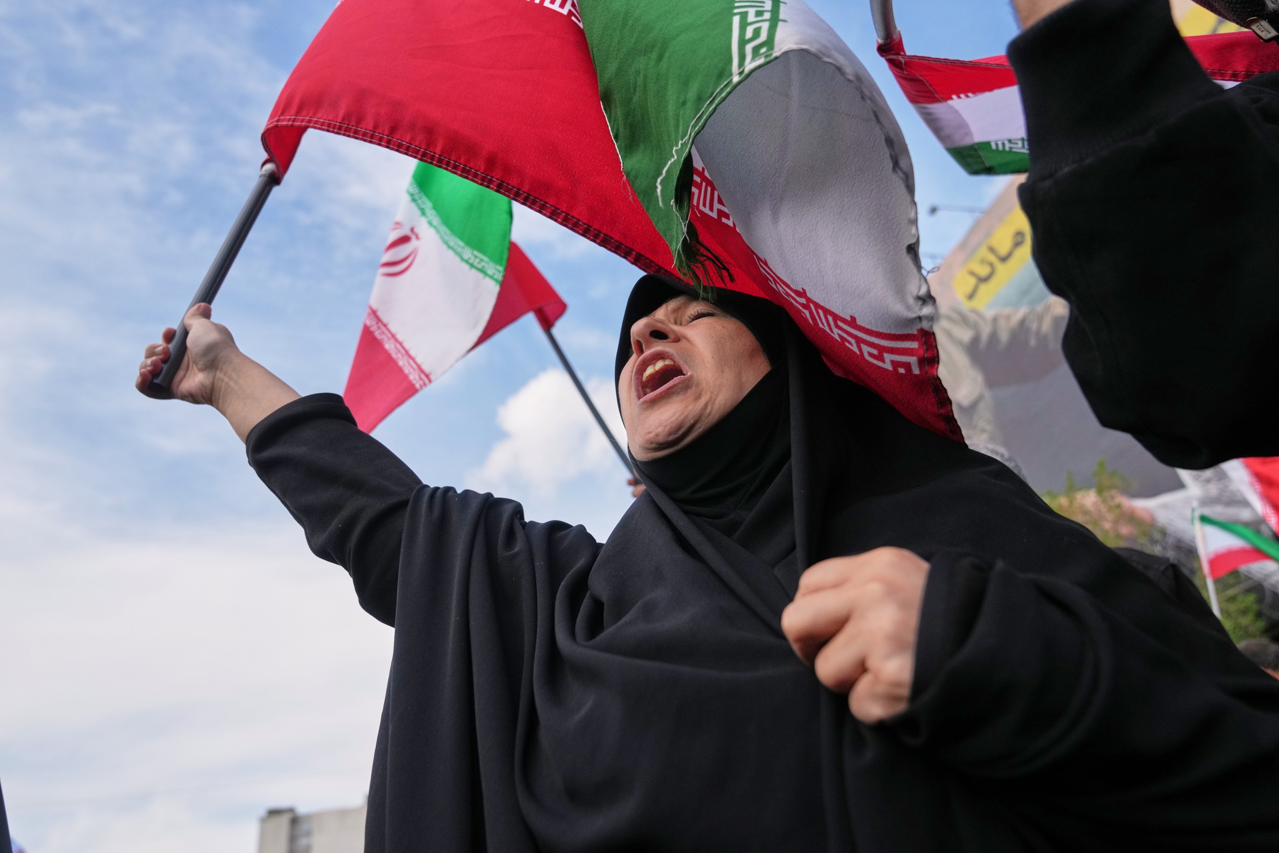 Government supporters chant slogans after the announcement of a two-week ceasefire with the United States and Israel in Tehran, Iran, on April 8. Photo: AP