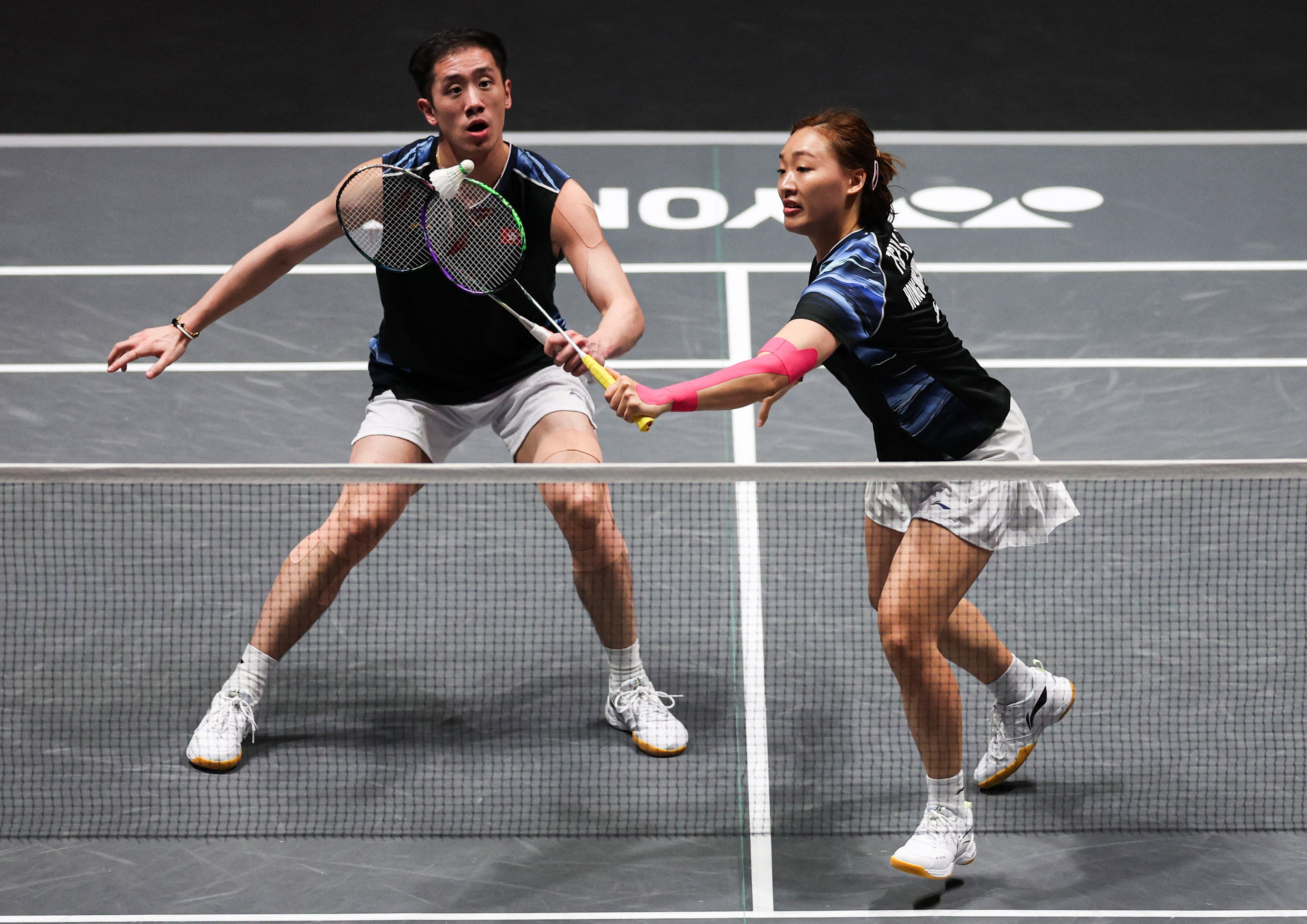 Tang Chun Man (left) and Tse Ying Suet, seen here at last month’s All England Open, were knocked out of the Badminton Asia Championships by China’s Chen Xing and Zhang Chi on Tuesday. Photo: Reuters
