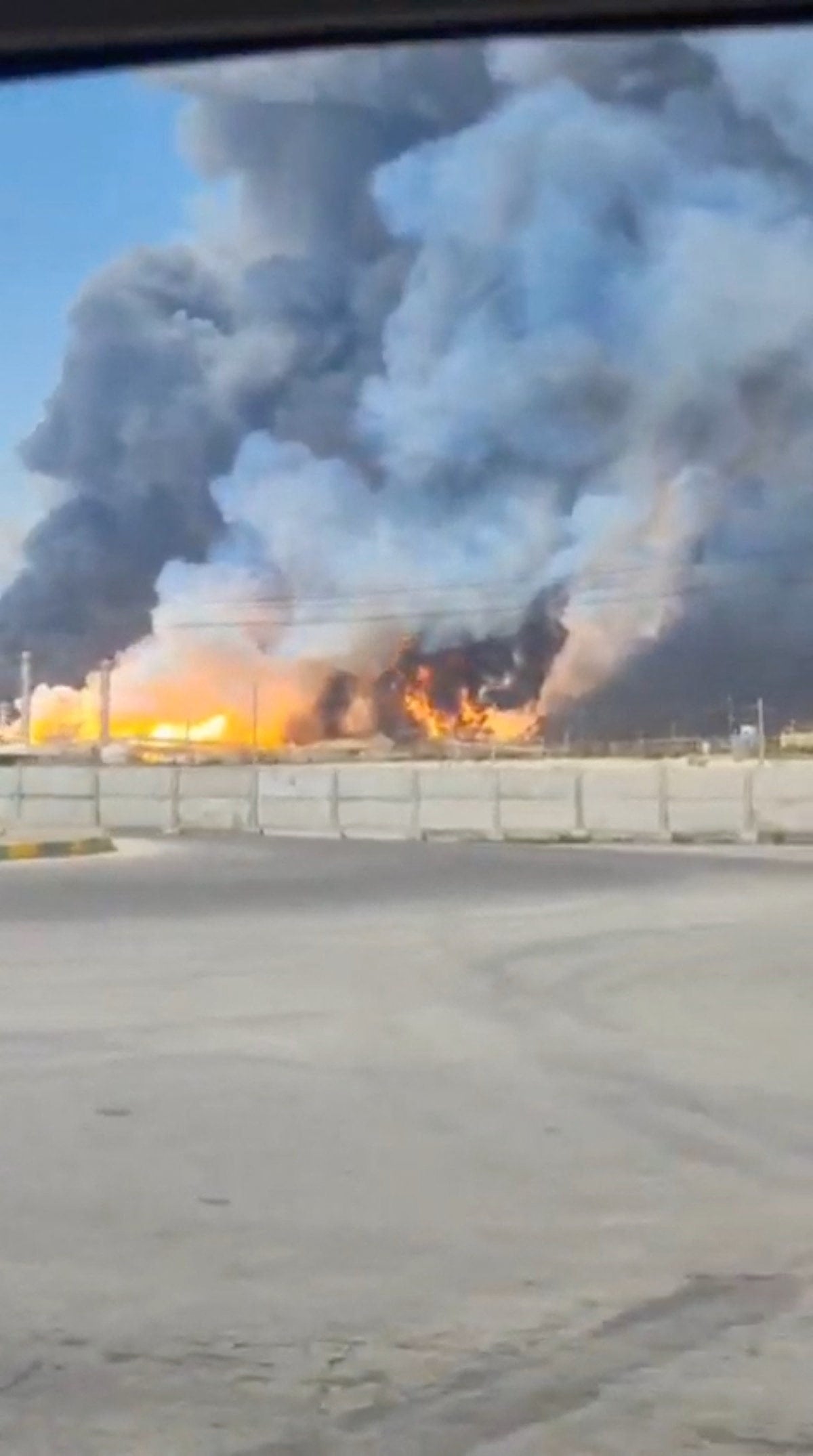 Smoke and fire rise near Iran’s South Pars gas field after an Israeli attack in March. Photo: via Reuters