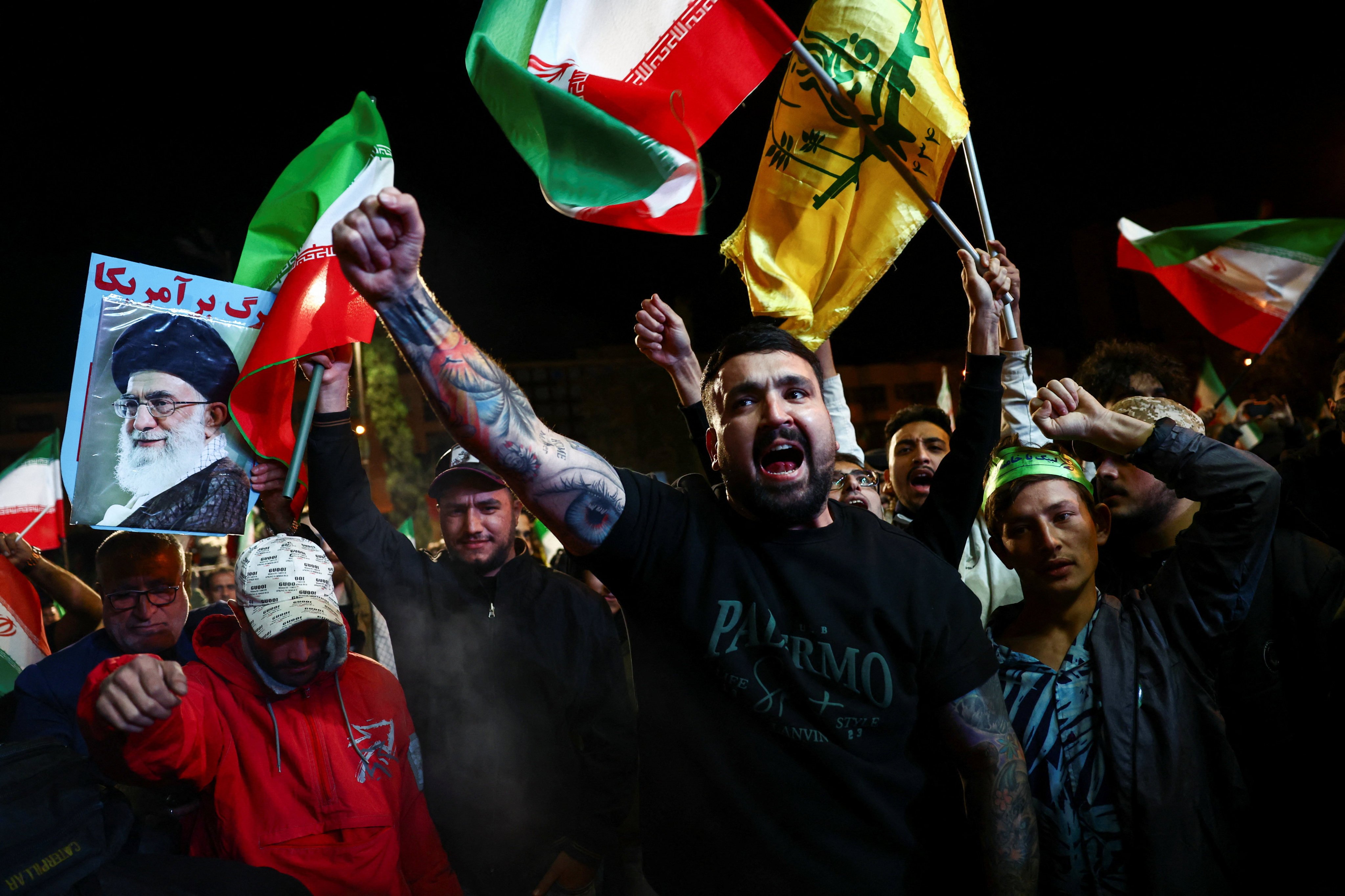 People shout slogans as they gather after a two-week ceasefire in the Iran war was announced, in Tehran, Iran, April 8, 2026. Majid Asgaripour/WANA (West Asia News Agency) via REUTERS ATTENTION EDITORS - THIS PICTURE WAS PROVIDED BY A THIRD PARTY.