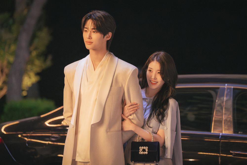 Byeon Woo-seok (left) and IU in a still from Perfect Crown. Photo: Disney+.