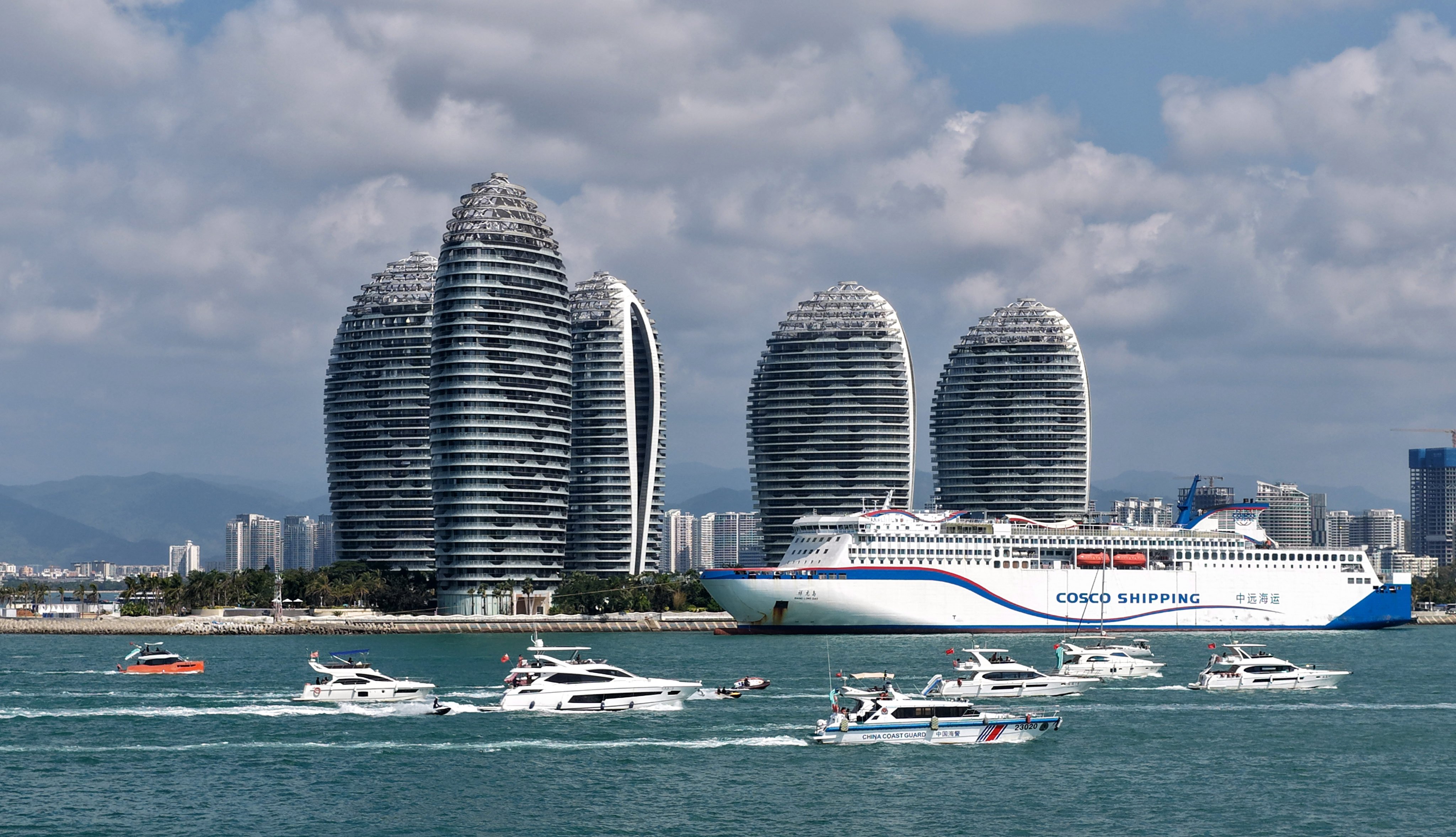 Tourists taking yachts in Hainan’s Sanya district, which has become a popular tourist destination and is the site of the Sanya ePrix for electric vehicles. Photo: Xinhua