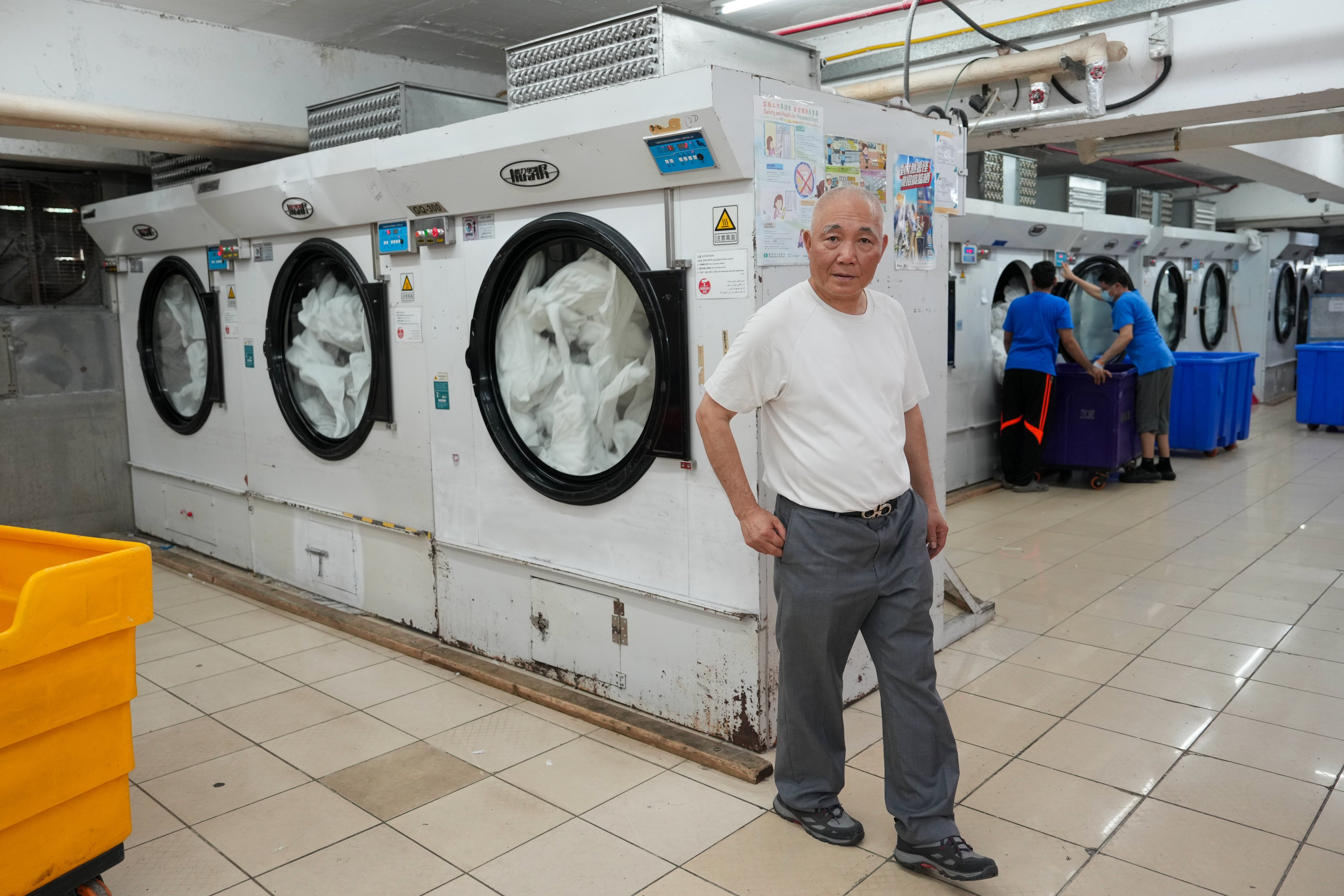 Lee Lam, Chairman of Yue Yi Laundry (Hong Kong) Limited, poses for pictures in his factory at Tuen Mun. The sharp rise of industrial diesel has significantly raised operating costs for laundry businesses, which rely heavily on diesel-powered boilers to generate steam for high-temperature washing and sterilisation, particularly for hospital linens and hotel laundry.
06APR26   SCMP/ Sam Tsang