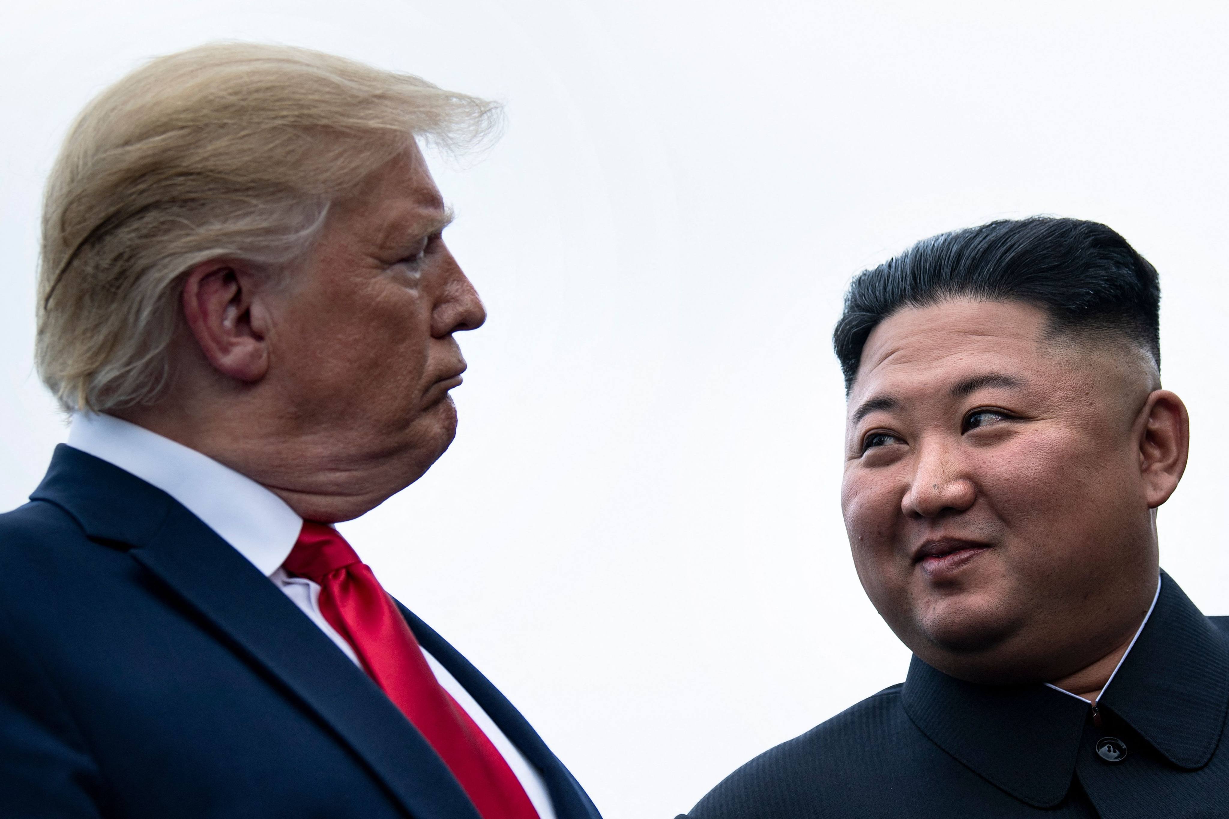 US President Donald Trump and North Korean leader Kim Jong-un talk before a meeting in the demilitarised zone in Panmunjom on June 30, 2019. Photo: AFP