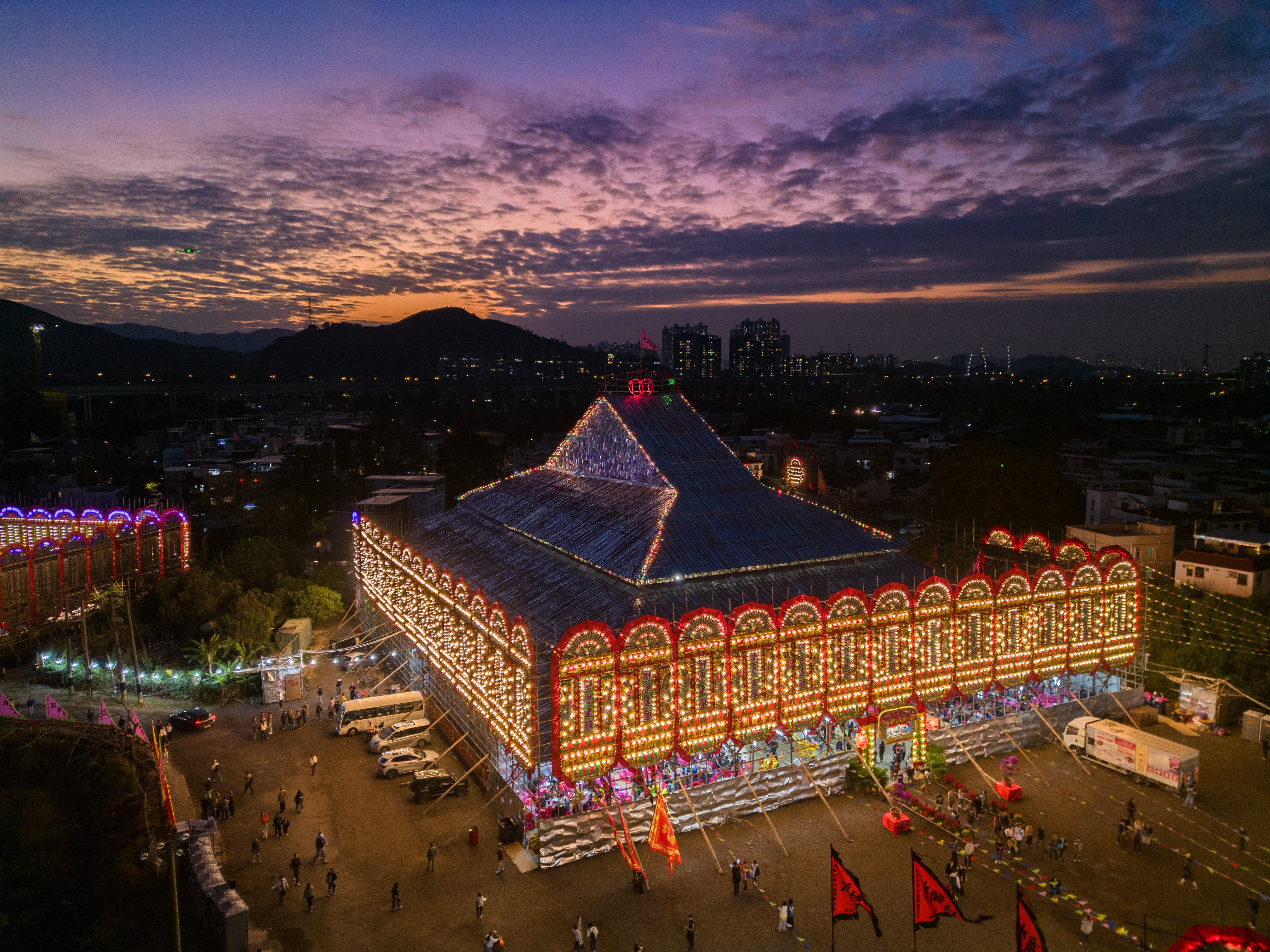 The Guinness record-setting bamboo pavilion built for the thanksgiving festival organised by the indigenous Tang clan of Kam Tin is lit up in Yuen Long on December 15, 2025. To improve the quality and diversity of mega-events in Hong Kong, unique local festivals could be included. Photo: Eugene Lee