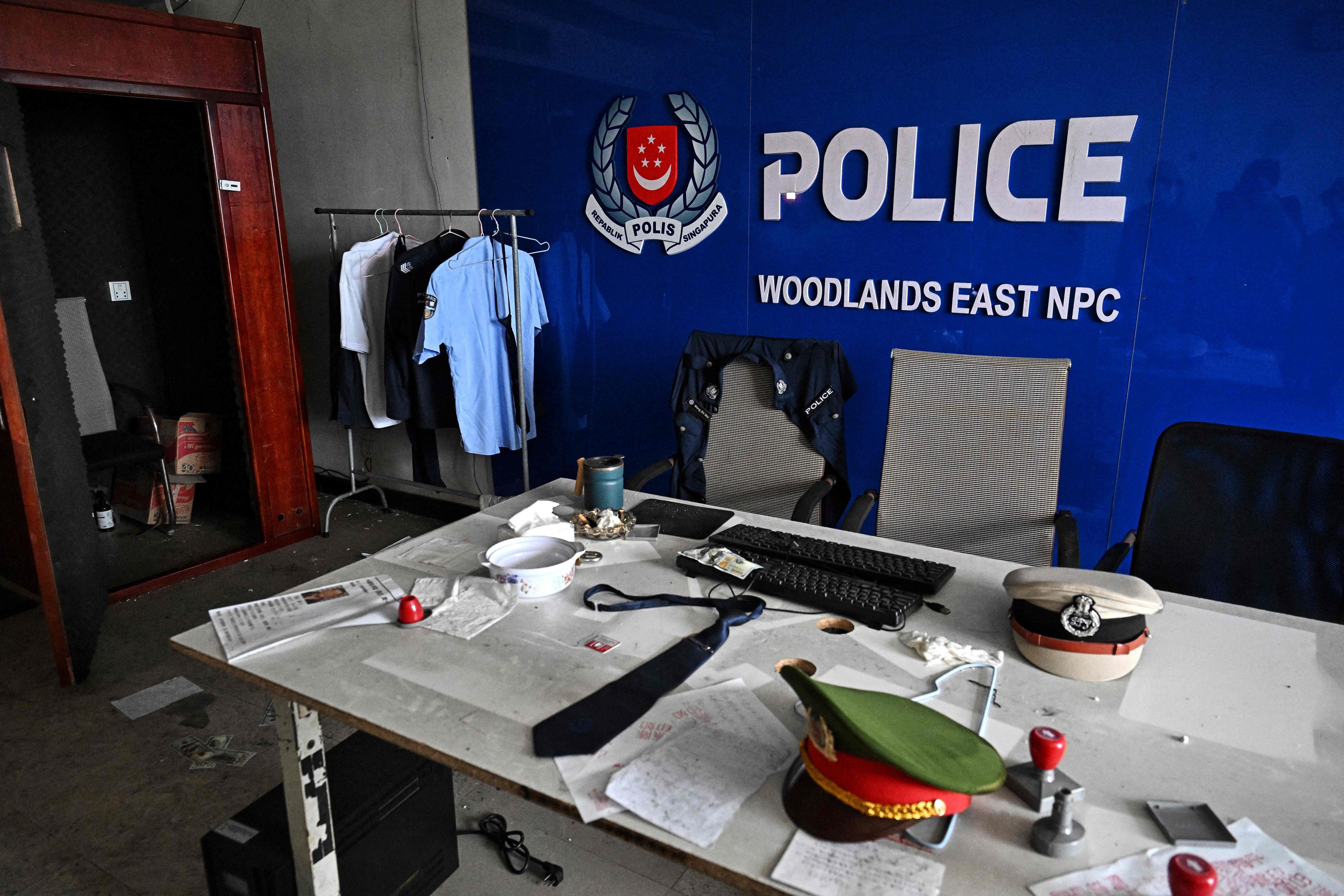 A fake Singapore police station is seen inside an abandoned scam centre in O’Smach town on the Thai-Cambodian border on March 12. Photo: AFP