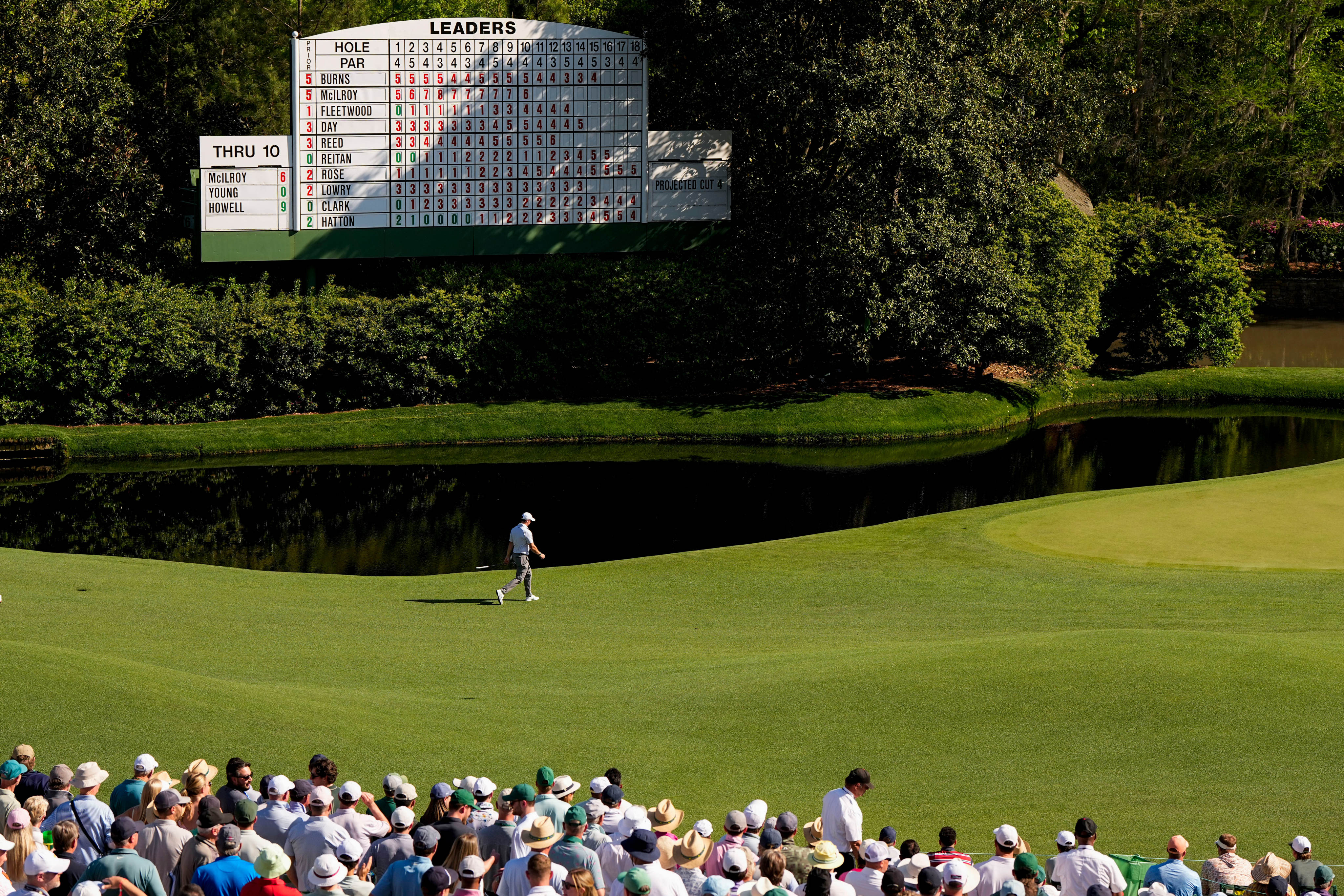 Rory McIlroy walks to green on the 11th hole during the second round of the Masters. Photo: AP