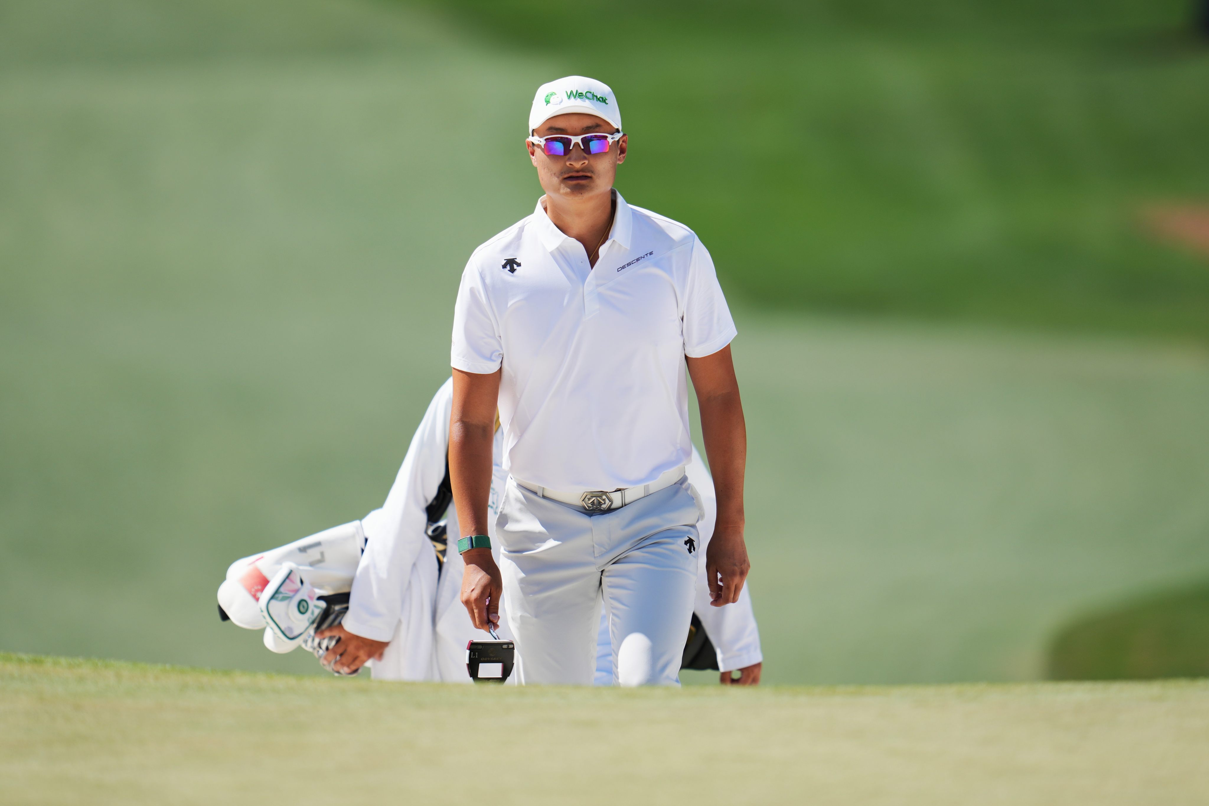 Li Haotong was thinking of pulling out on the second day after throwing up at the practice range, but started playing better after walking on the course. Photo: Xinhua