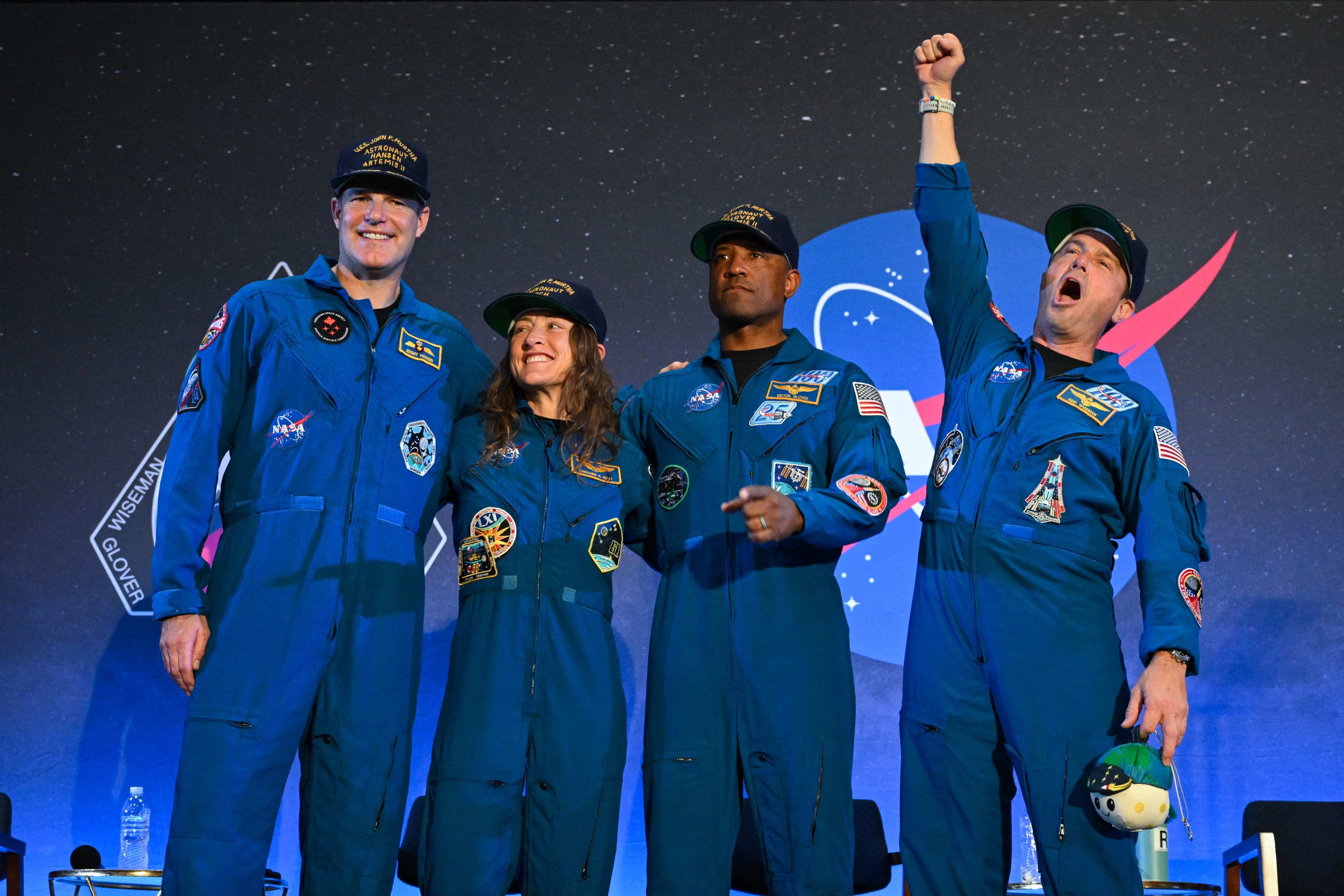 Artemis II astronauts Jeremy Hansen, Christina Koch, Victor Glover and Reid Wiseman react during a welcoming ceremony in Houston, Texas, on Saturday. Photo: AFP