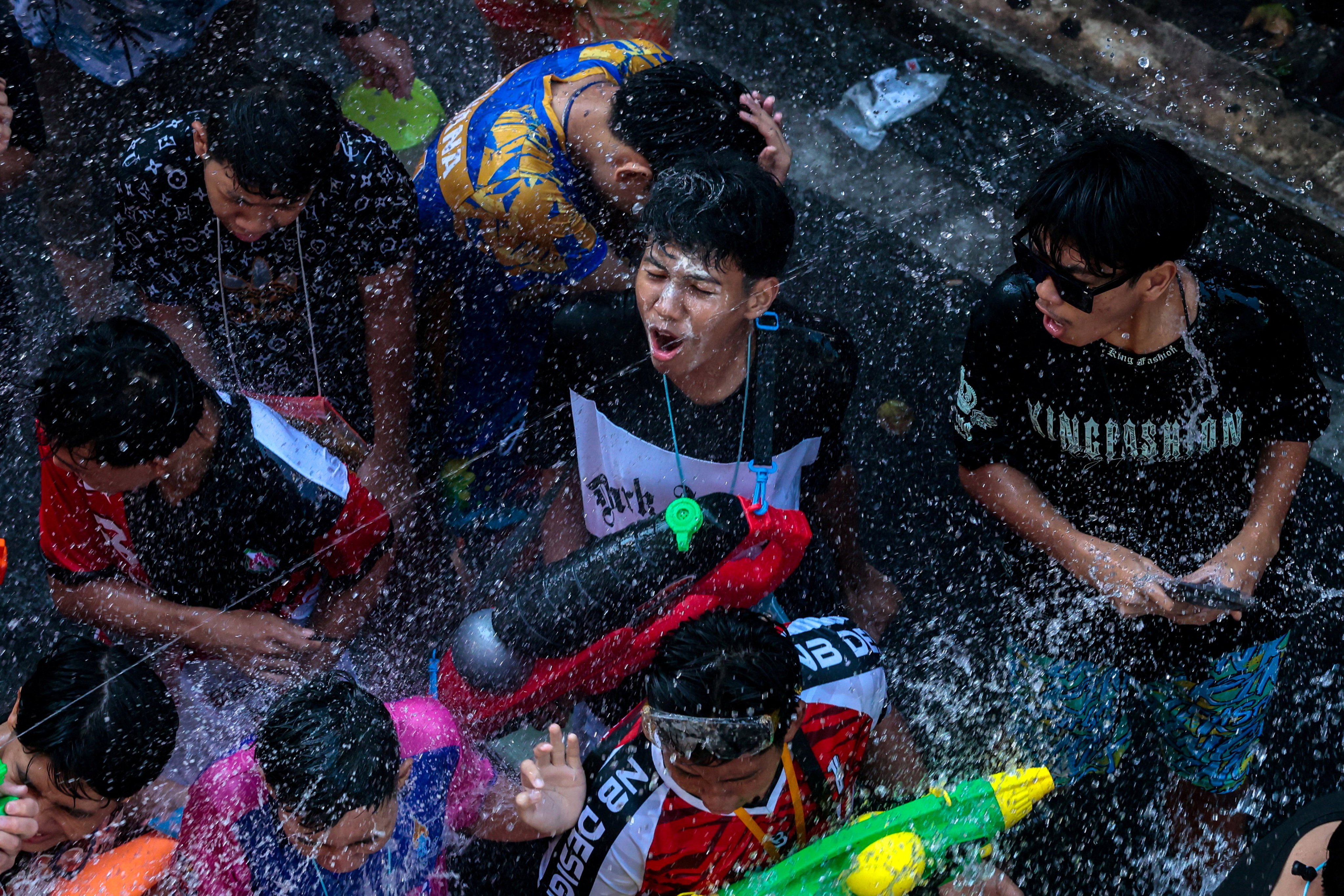 Revellers celebrate in Bangkok, Thailand, on Sunday, the eve of Songkran. Photo: Reuters