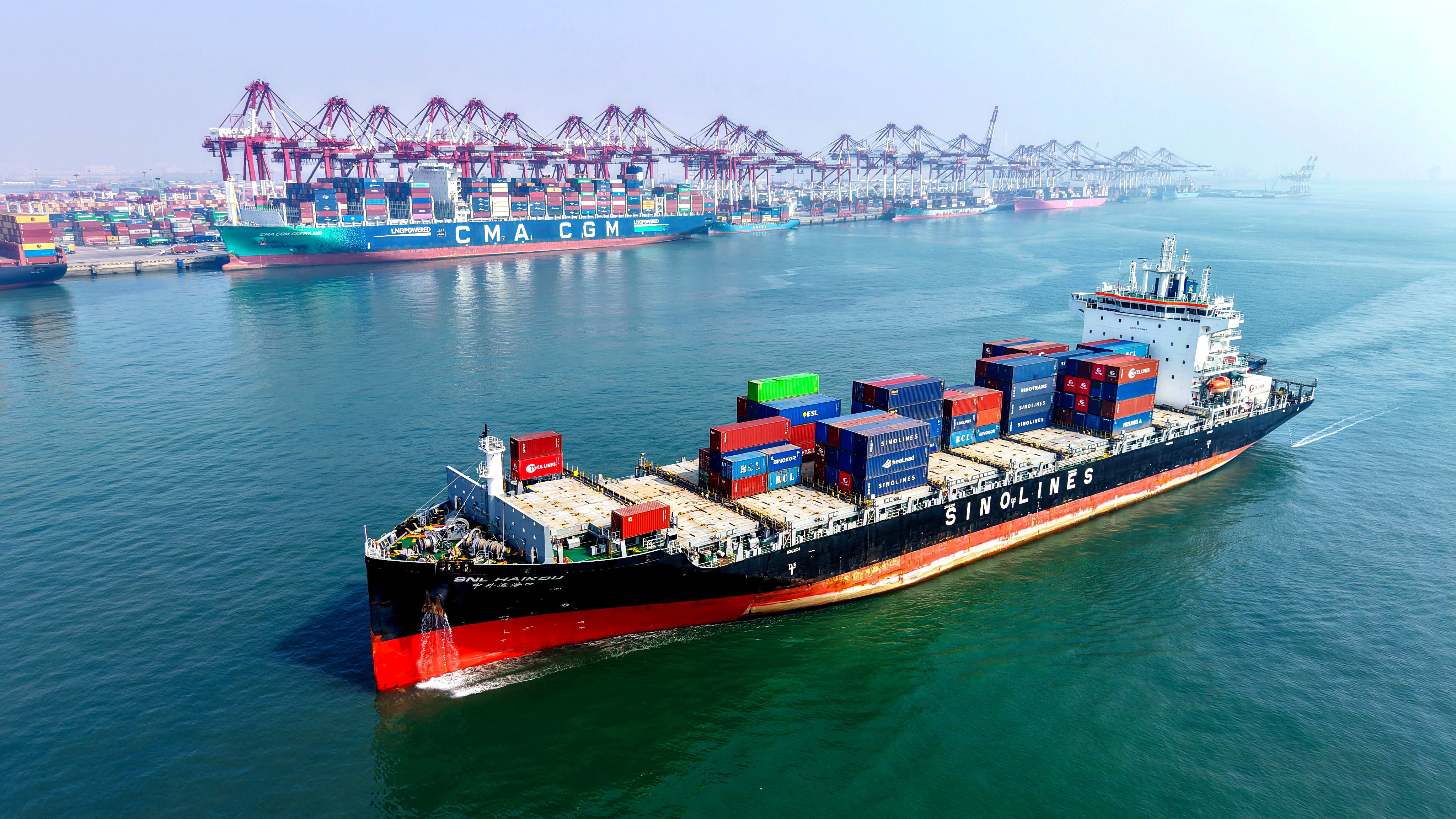 A container ship arrives at the Qingdao Port in Shandong province. The port opened seven new container shipping routes in the first quarter of this year. Photo: Xinhua