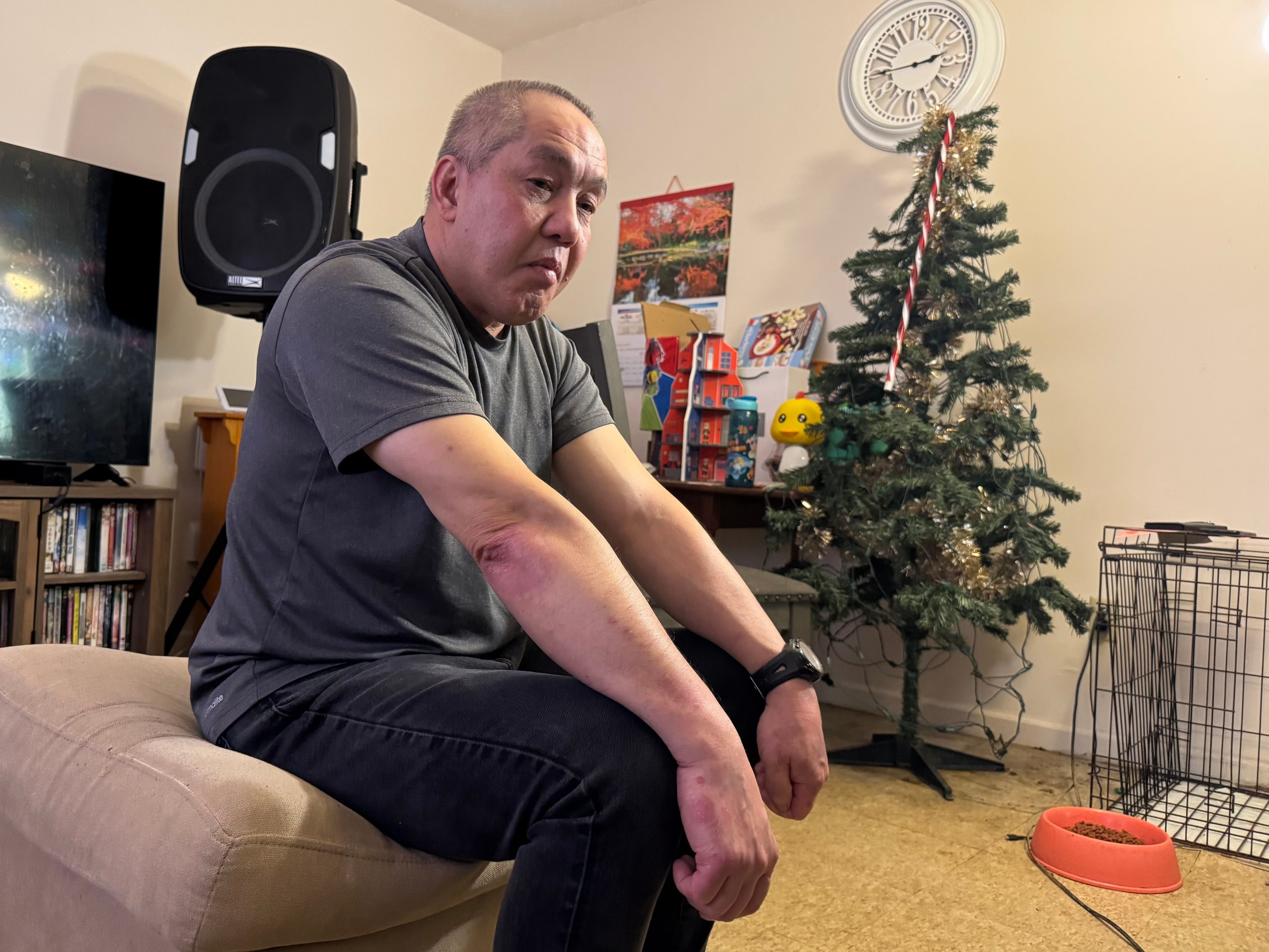 ChongLy “Scott” Thao, a US citizen, at his home in St Paul, Minnesota on January 19, the day after he was detained by federal agents. Photo: AP