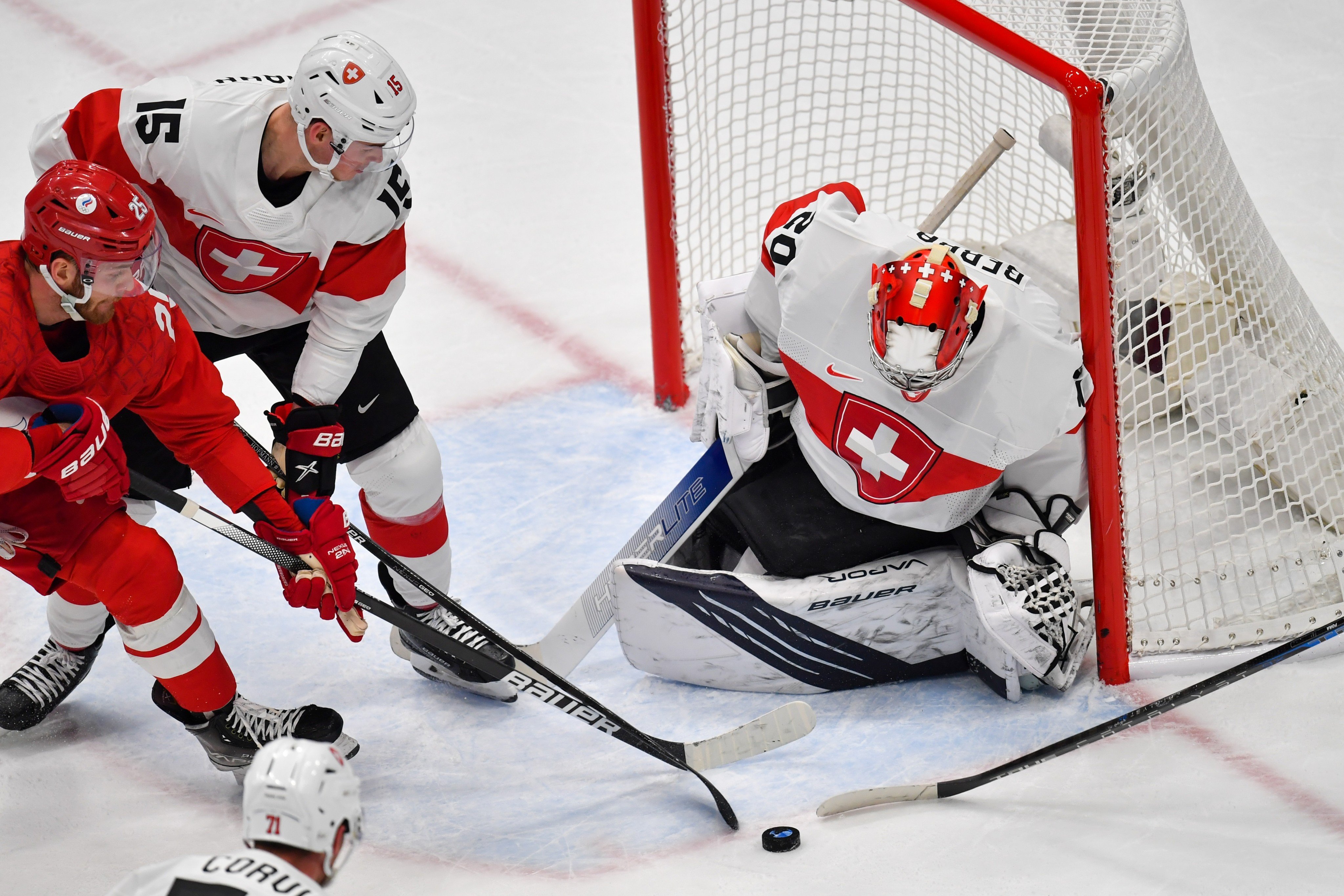 Switzerland reached the quarter-finals at the 2022 Beijing Winter Olympics, where Covid-19 testing was a requirement. Photo: Shutterstock