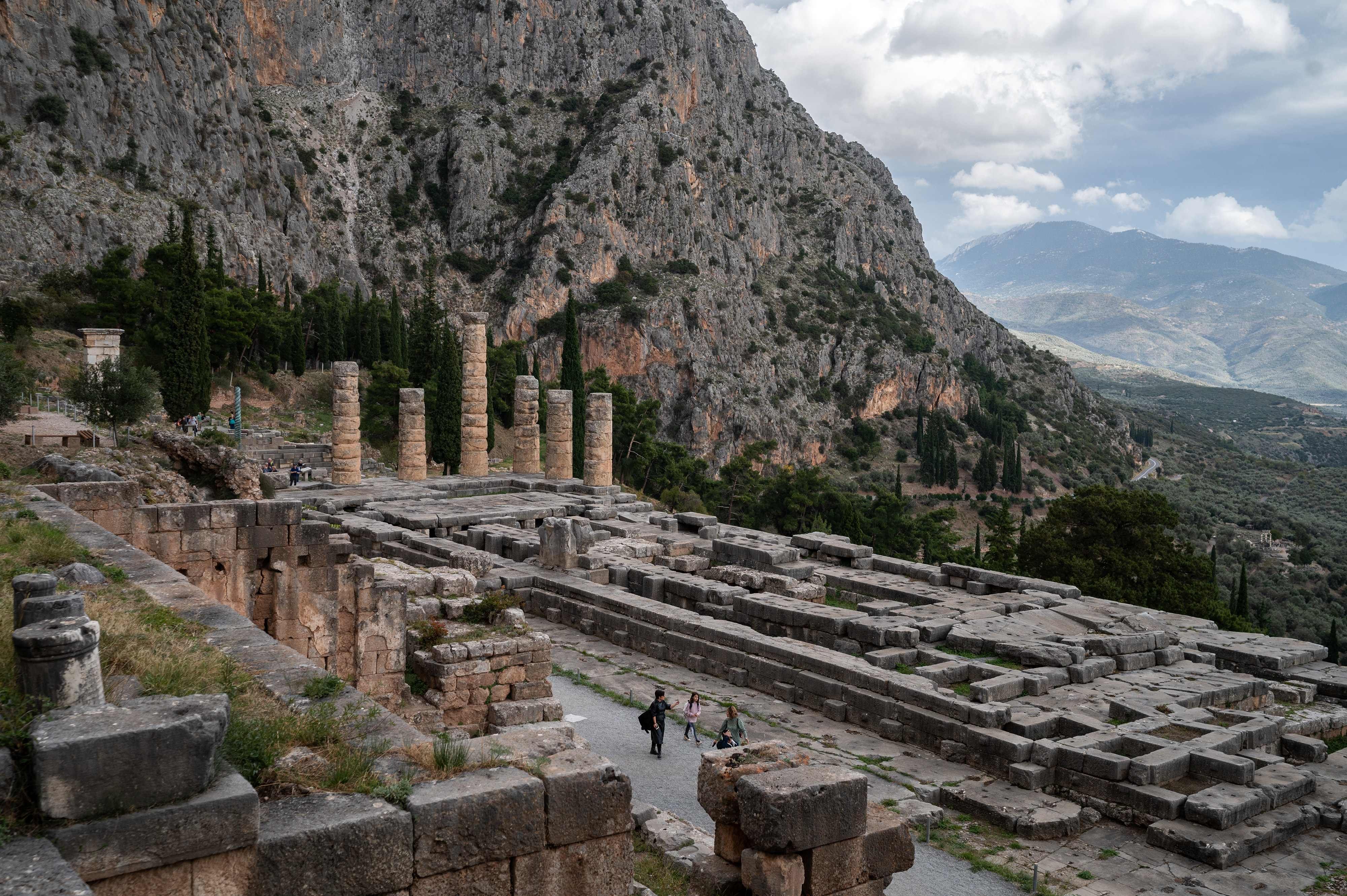 Visitors at the archaeological site Delphi, a Unesco World Heritage site in Greece at risk of being destroyed by climate change. Photo: AFP