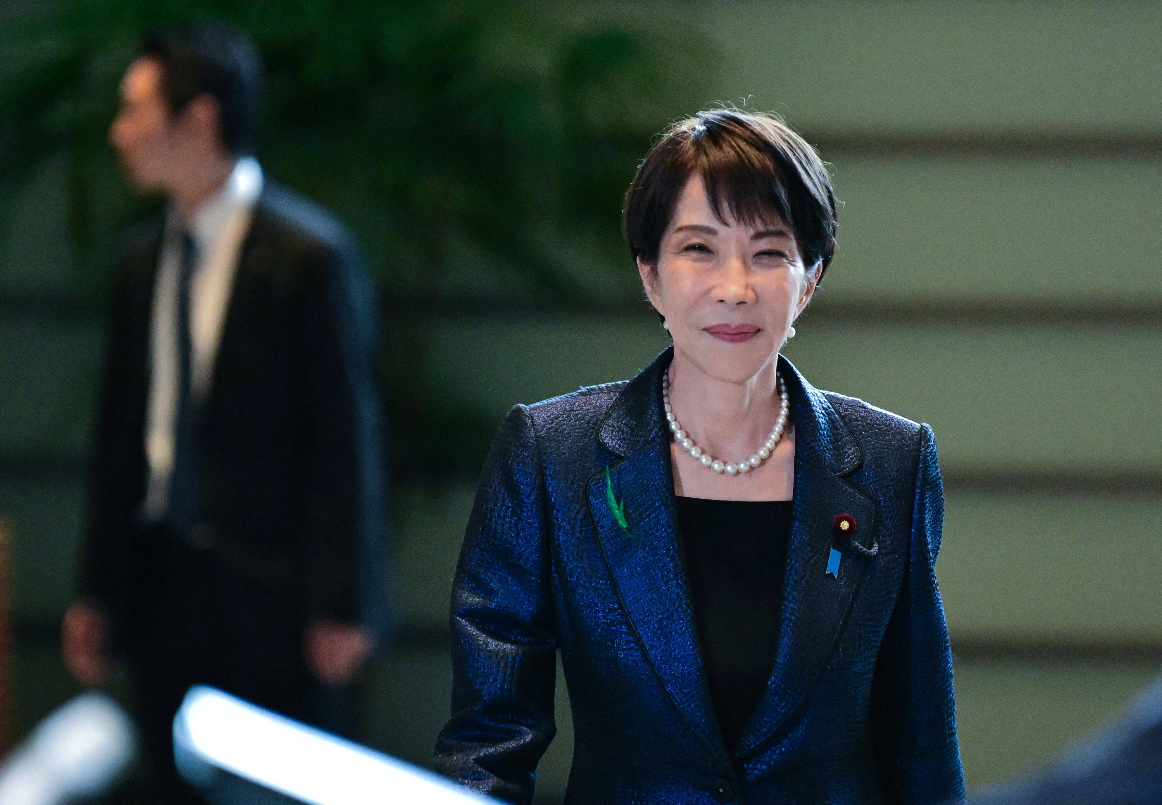 Japan’s Prime Minister Sanae Takaichi arrives to a press conference at the Prime Minister’s Office in Tokyo on Wednesday. Photo: AFP
