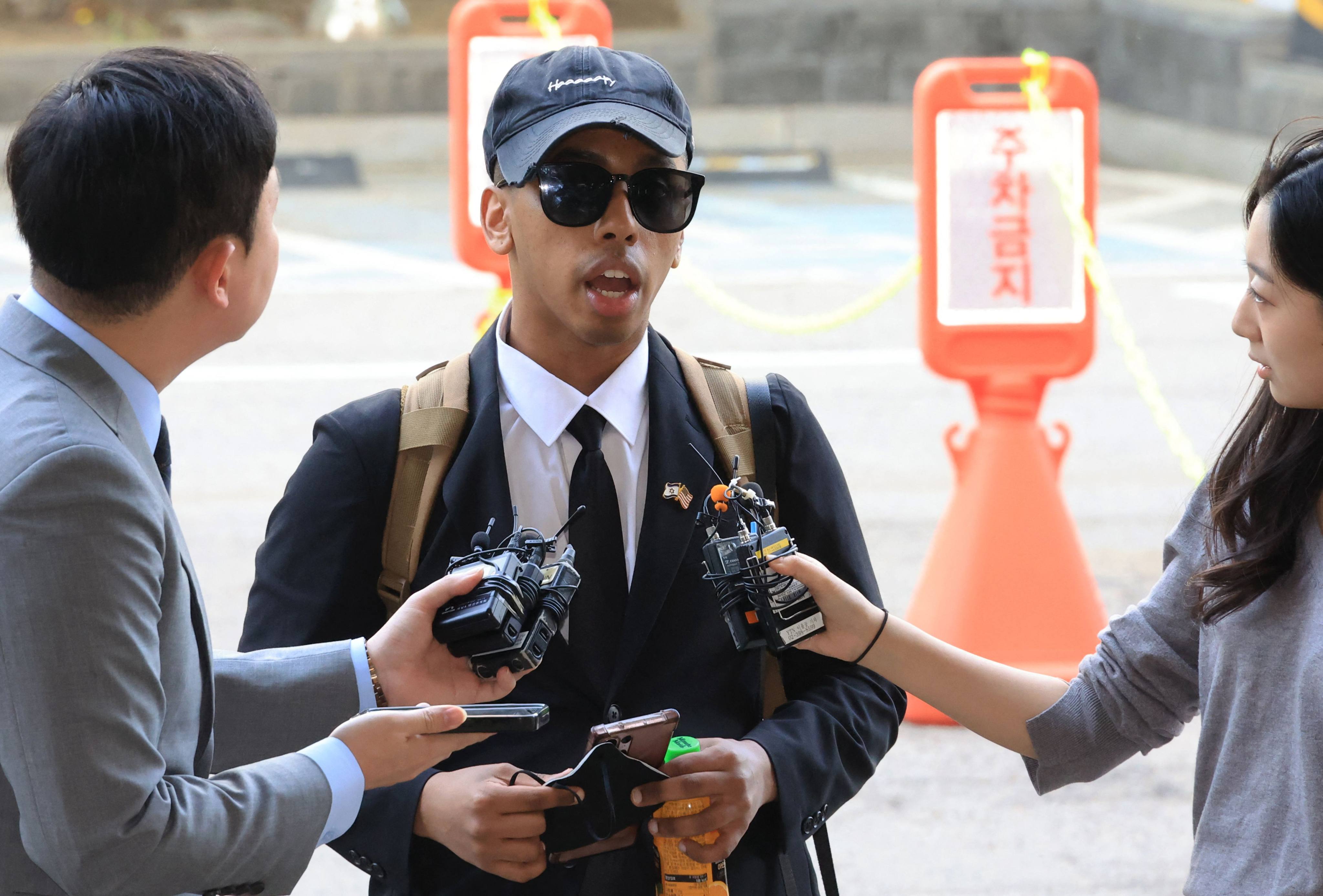 American YouTuber Johnny Somali speaks to reporters at the Seoul Western District Court in South Korea on Wednesday. Photo: Yonhap/AFP