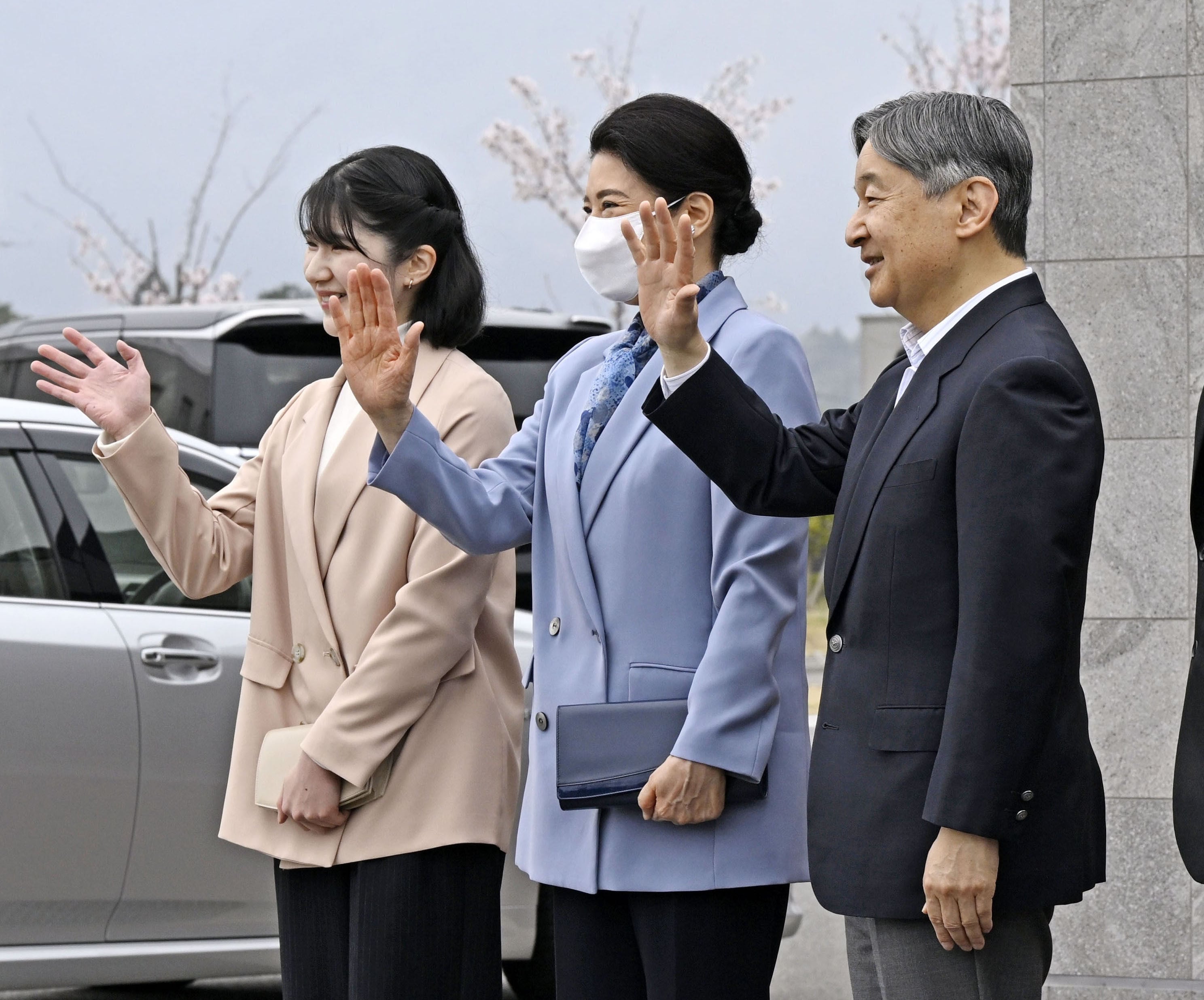 (From R) Japan’s Princess Aiko and her parents, Empress Masako and Emperor Naruhito, wave to well-wishers after arriving at the Historical Archive Museum of Tomioka in Tomioka, Fukushima Prefecture, on April 7. Photo: Kyodo