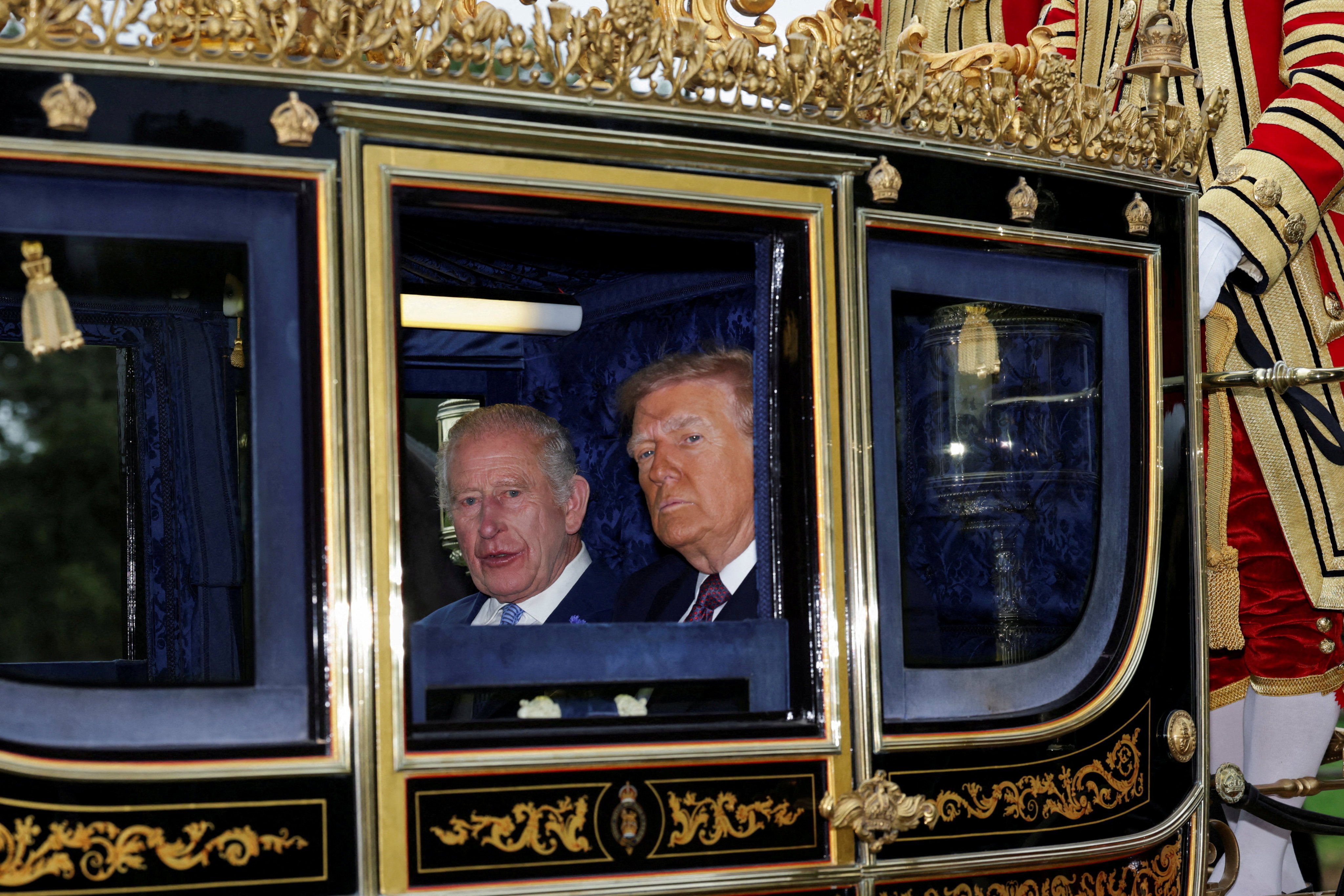 Britain’s King Charles and US President Donald Trump during a procession through Windsor Castle on September 17. Photo: Reuters