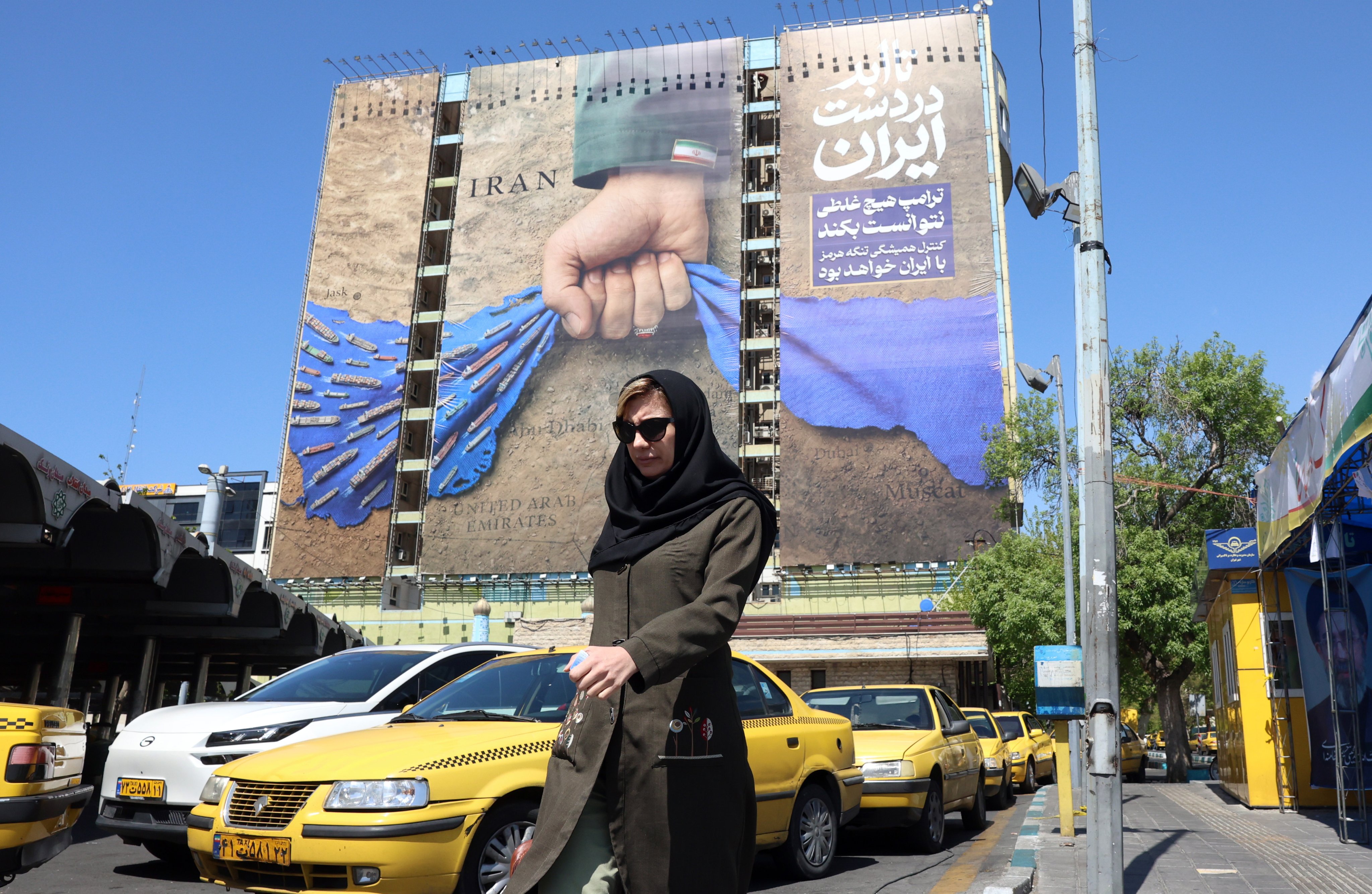 “Forever in Iran’s hand”, a large billboard proclaims in Persian in a reference to the Strait of Hormuz, in Tehran on April 15. Photo: EPA