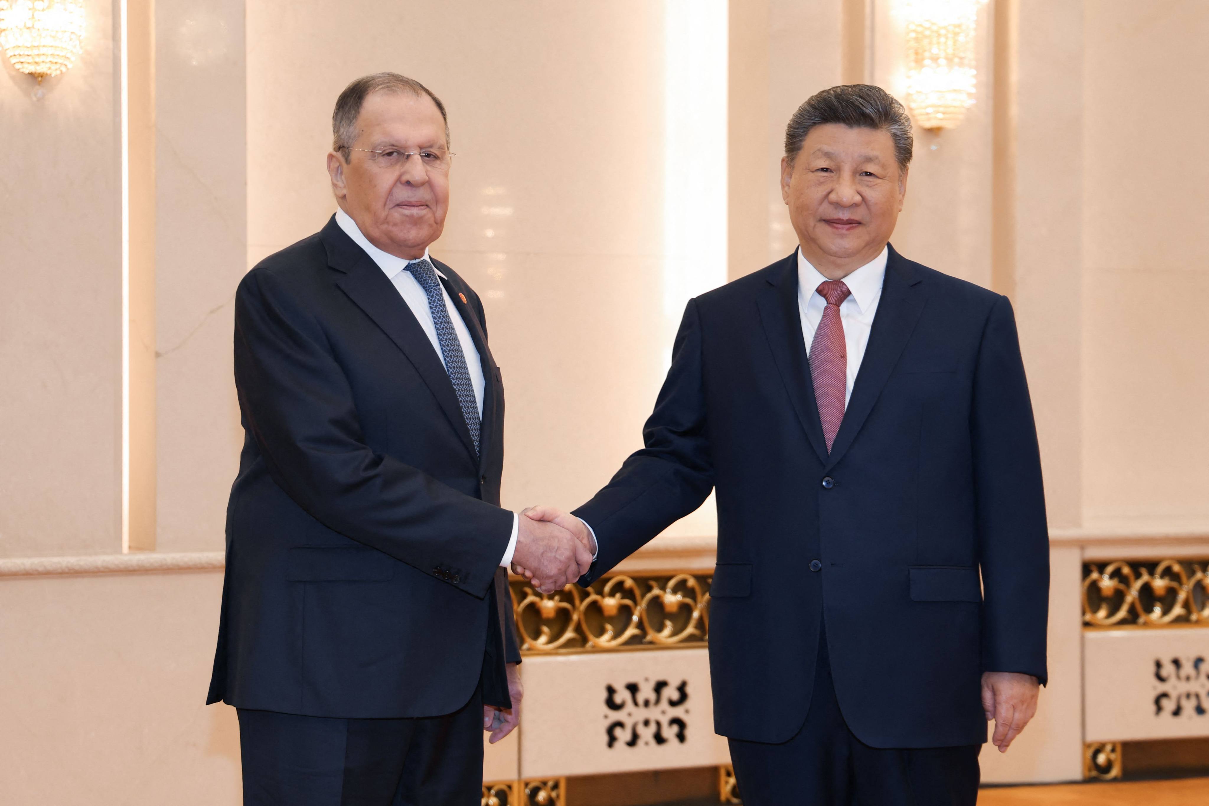Russian Foreign Minister Sergei Lavrov and Chinese President Xi Jinping. Photo: Russian Foreign Ministry/AFP