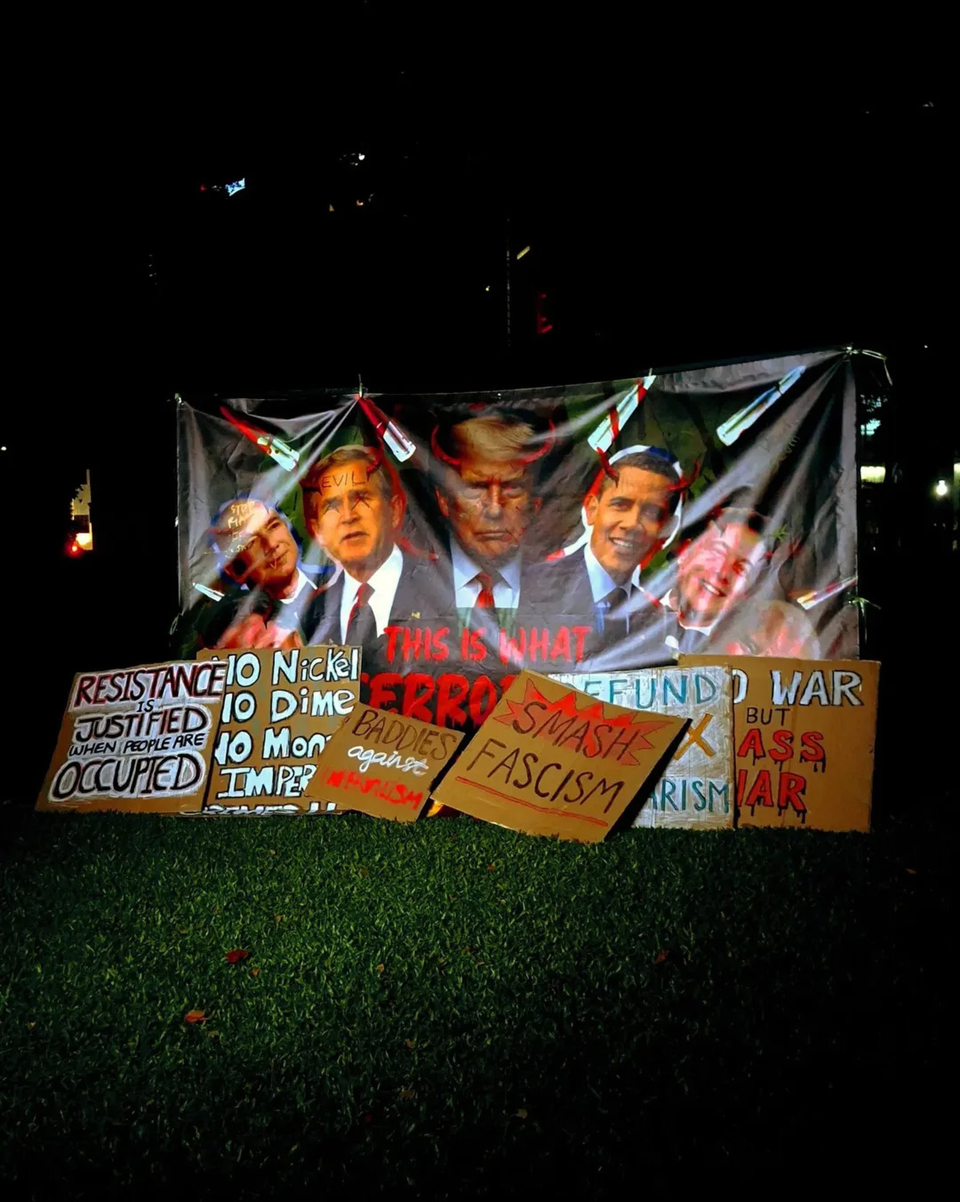 A banner at a protest in Singapore’s Hong Lim Park on Saturday shows   past and present US presidents with horns on their heads. Photo: Instagram/sgacadboycott