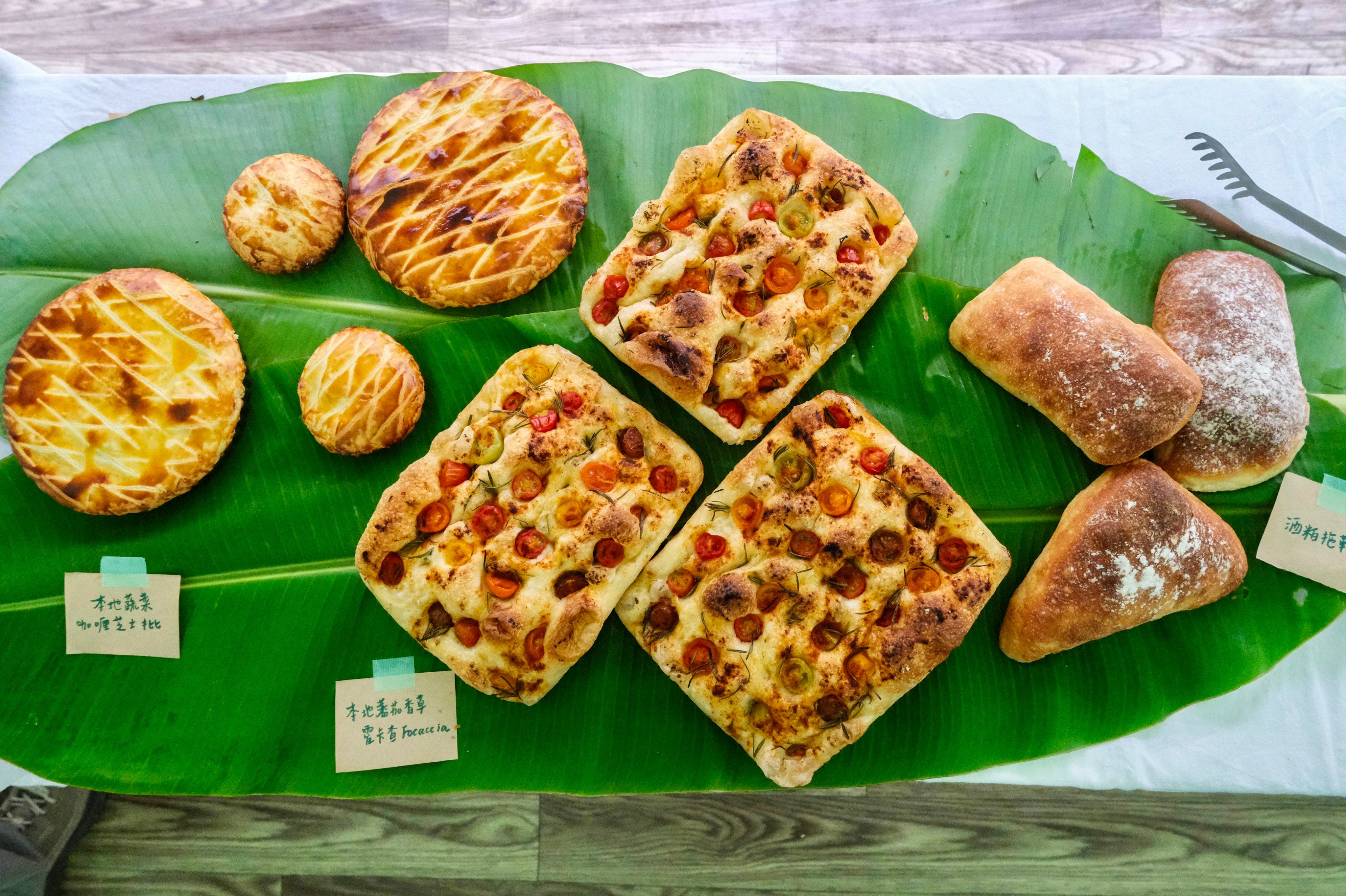 A spread of baked goods by Formless Daily at the Easter potluck gathering at Blue Girl Organic Farm in April 2026. Photo: Hei Kiu Au